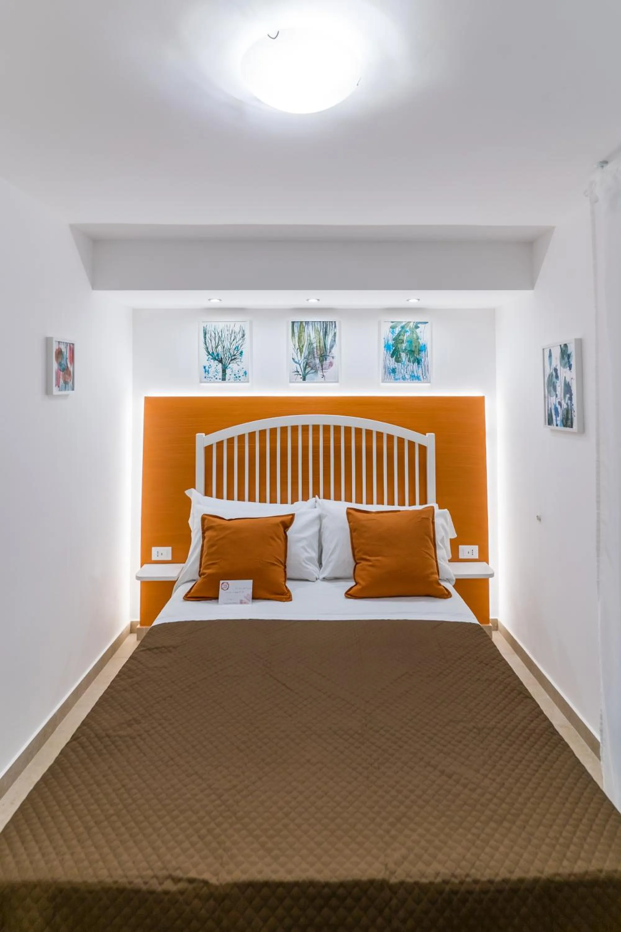 Bed in Mama Tita Rooms and Breakfast