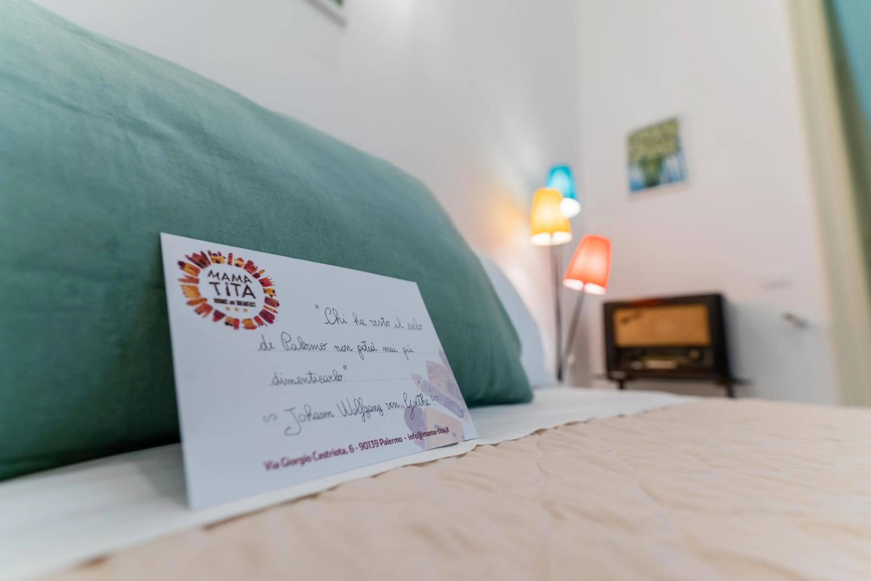 Bed in Mama Tita Rooms and Breakfast