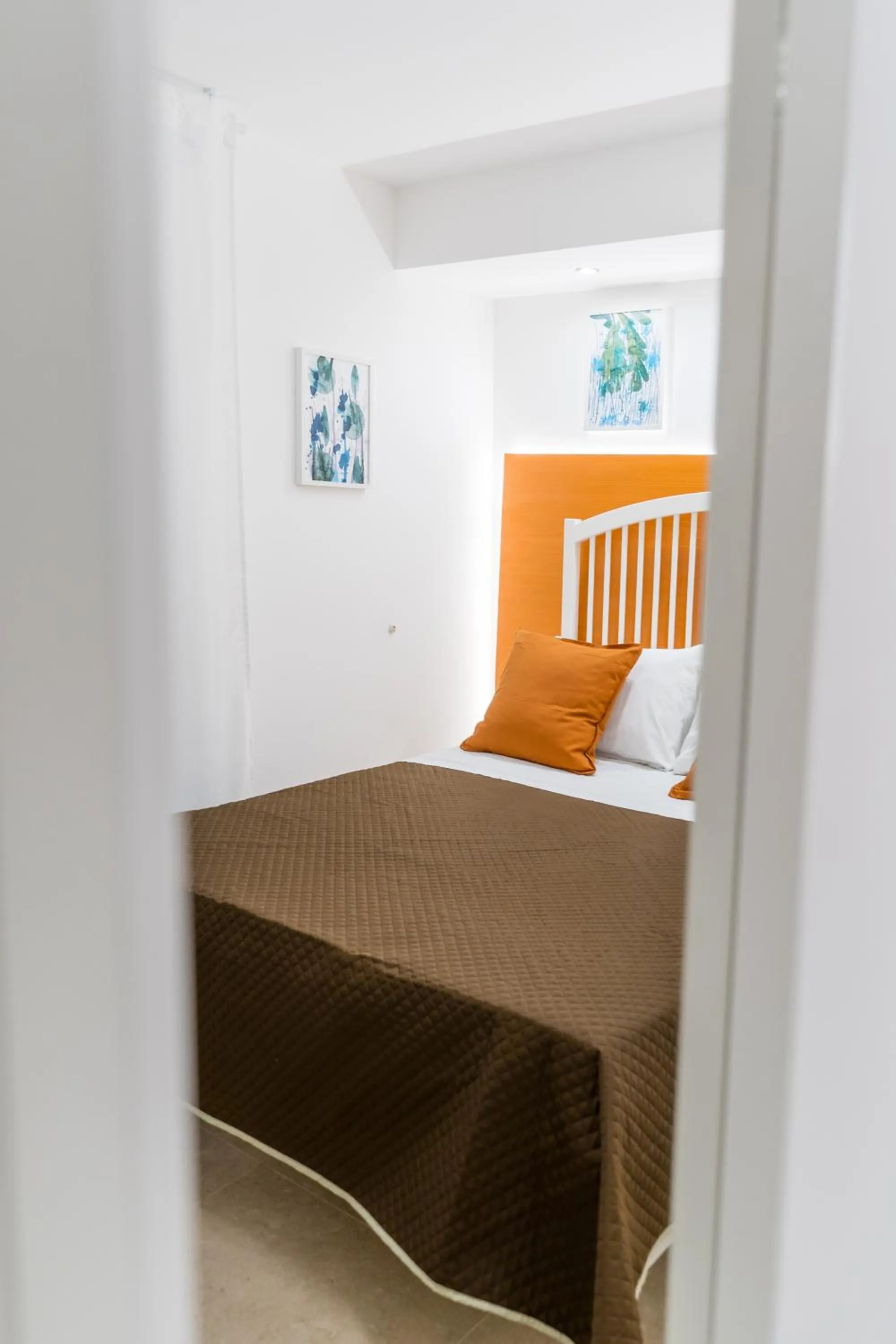 Bed in Mama Tita Rooms and Breakfast