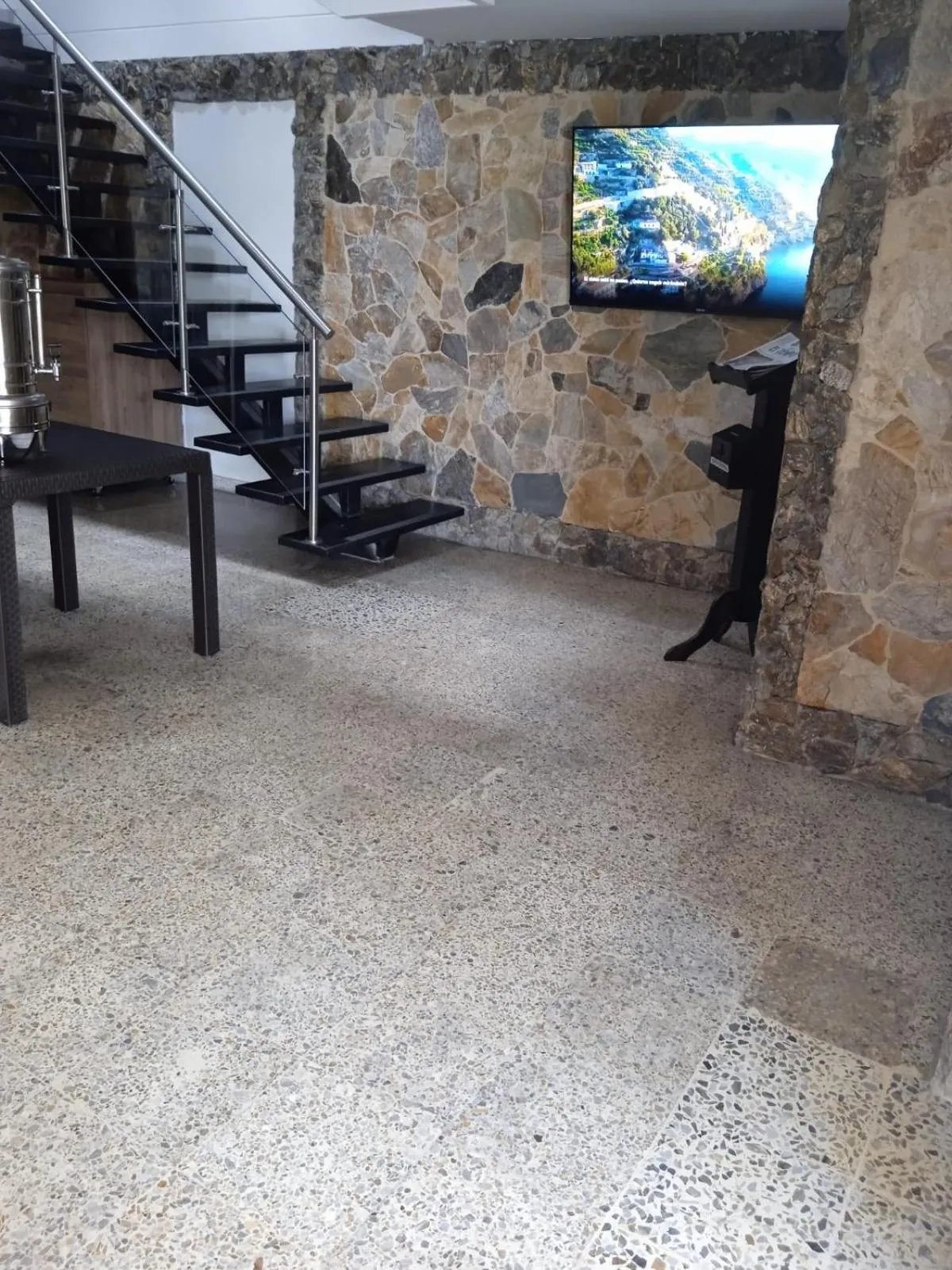 Communal lounge/ TV room in Hotel Urbano 70