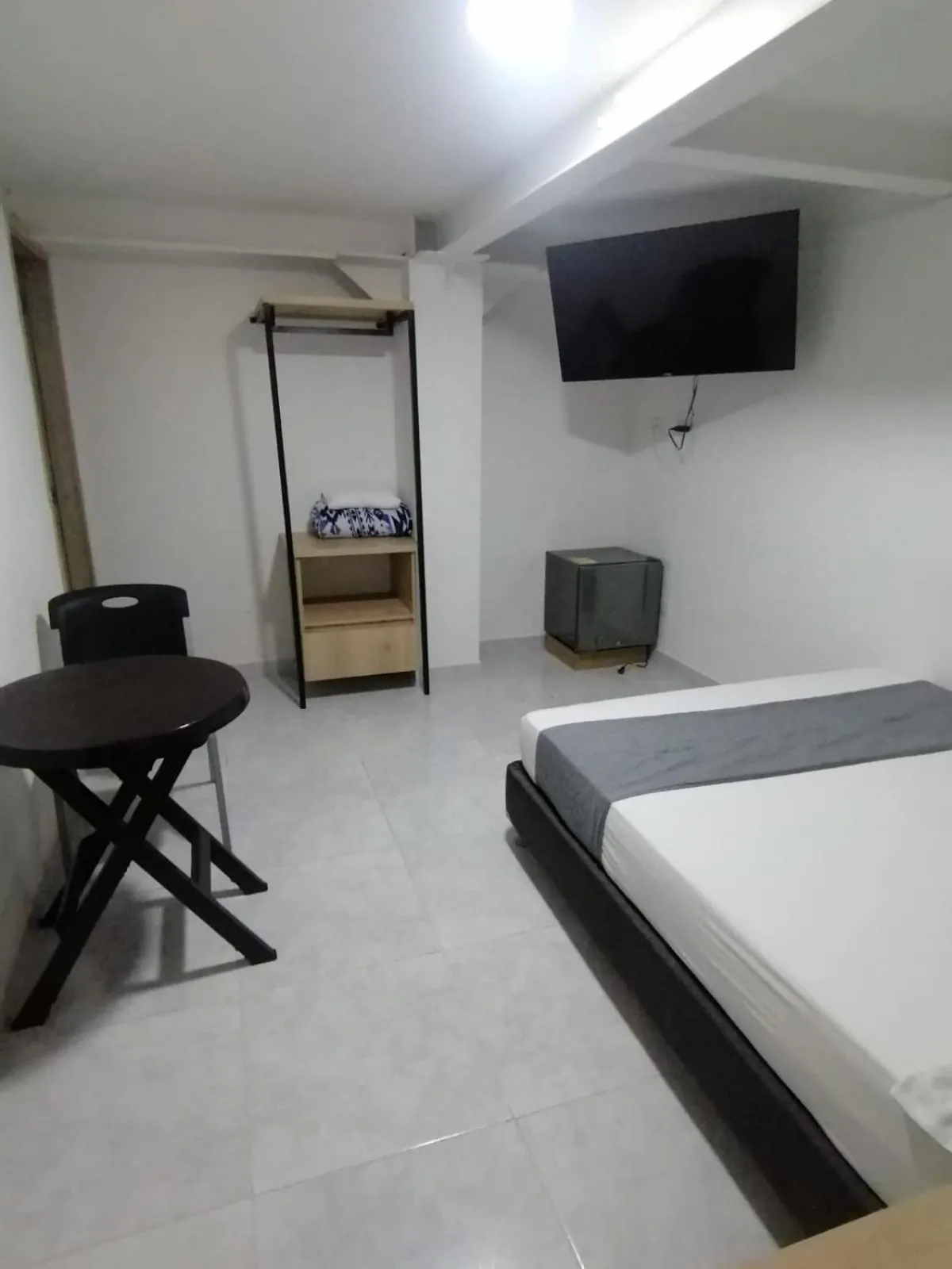 Photo of the whole room, Bed in Hotel Urbano 70