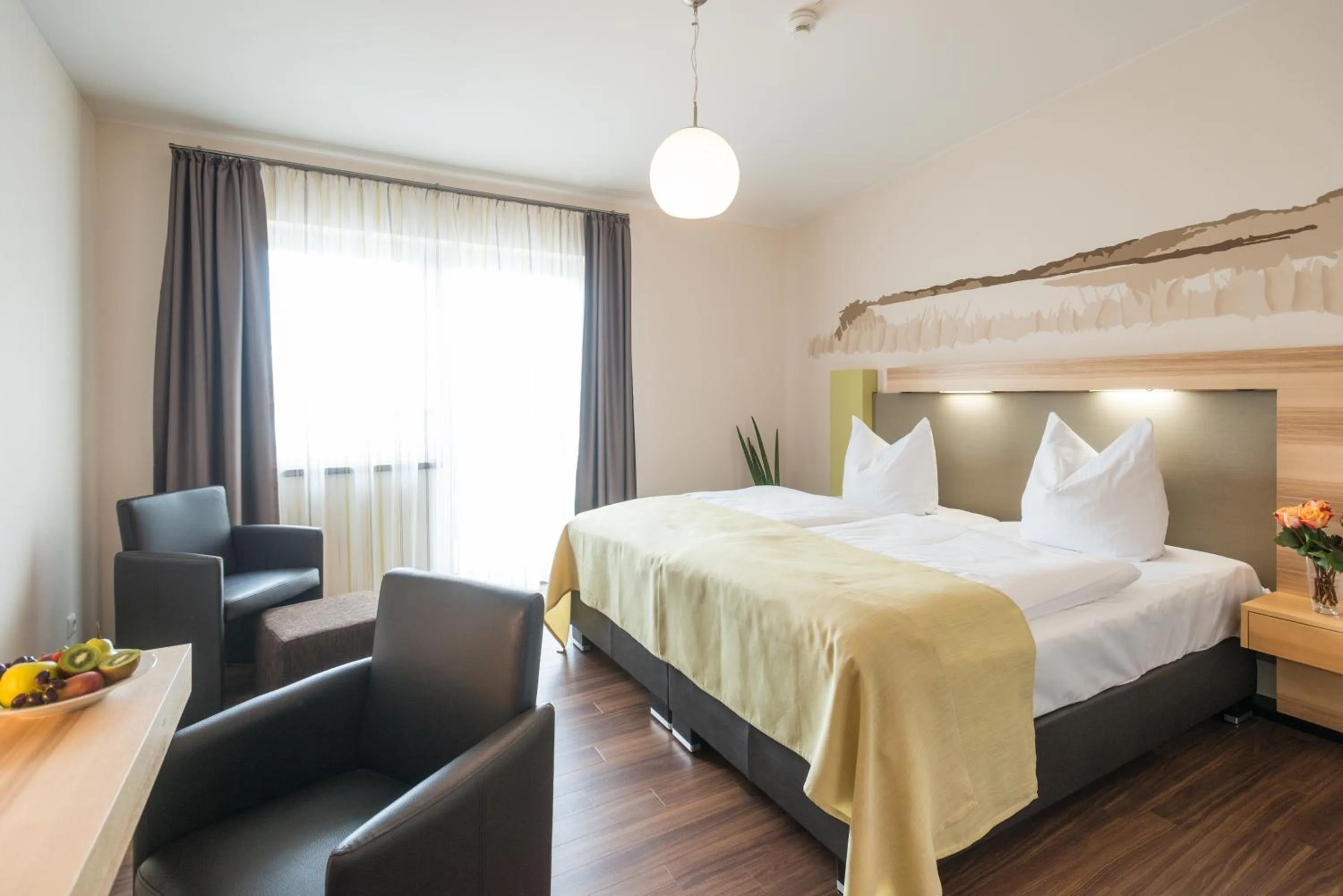 Bed in Brauers Landarthotel GmbH