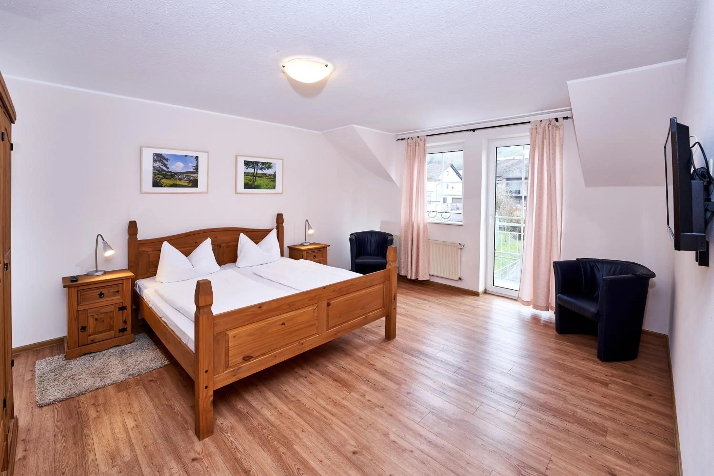 Bed in Brauers Landarthotel GmbH