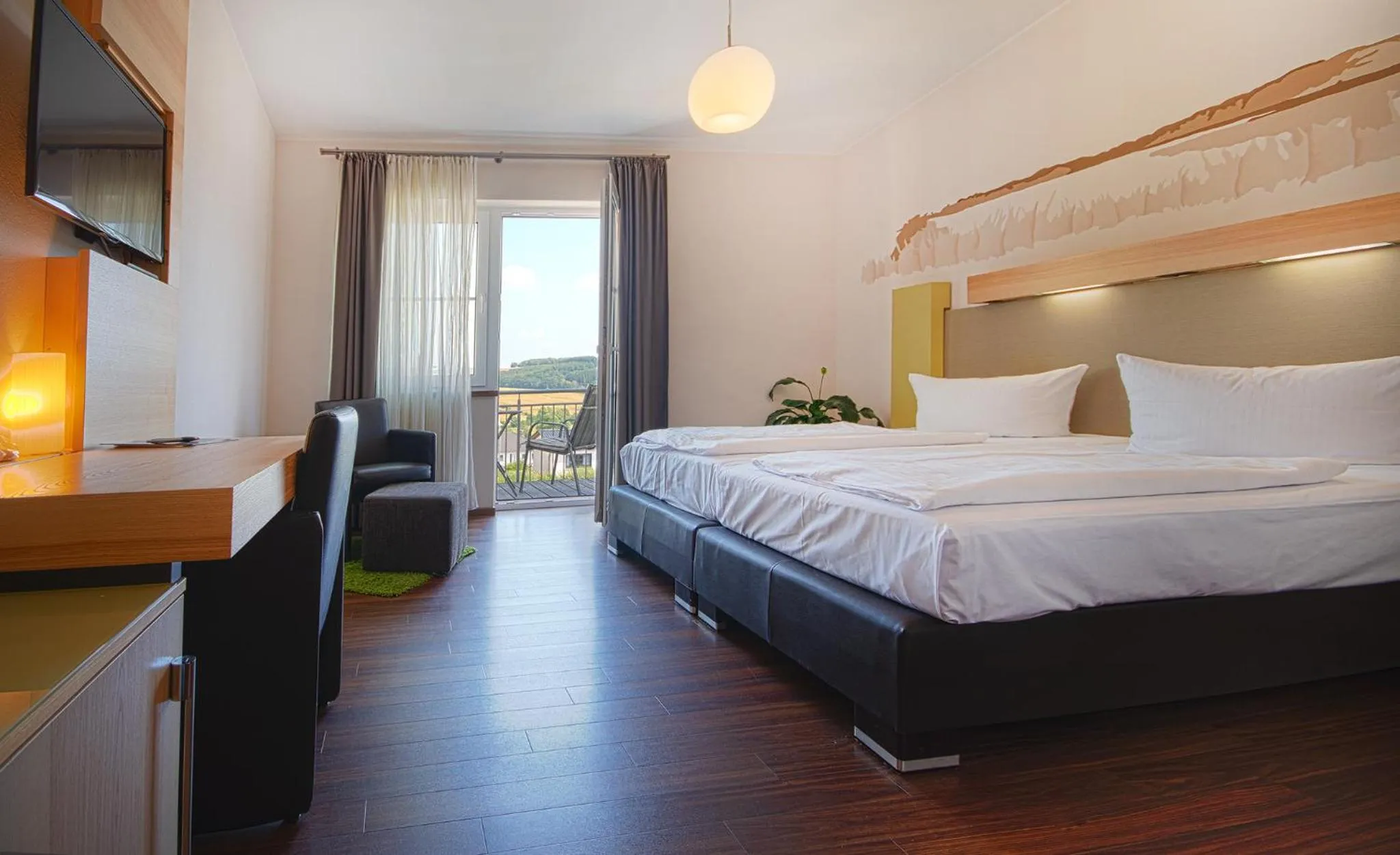 Bed in Brauers Landarthotel GmbH