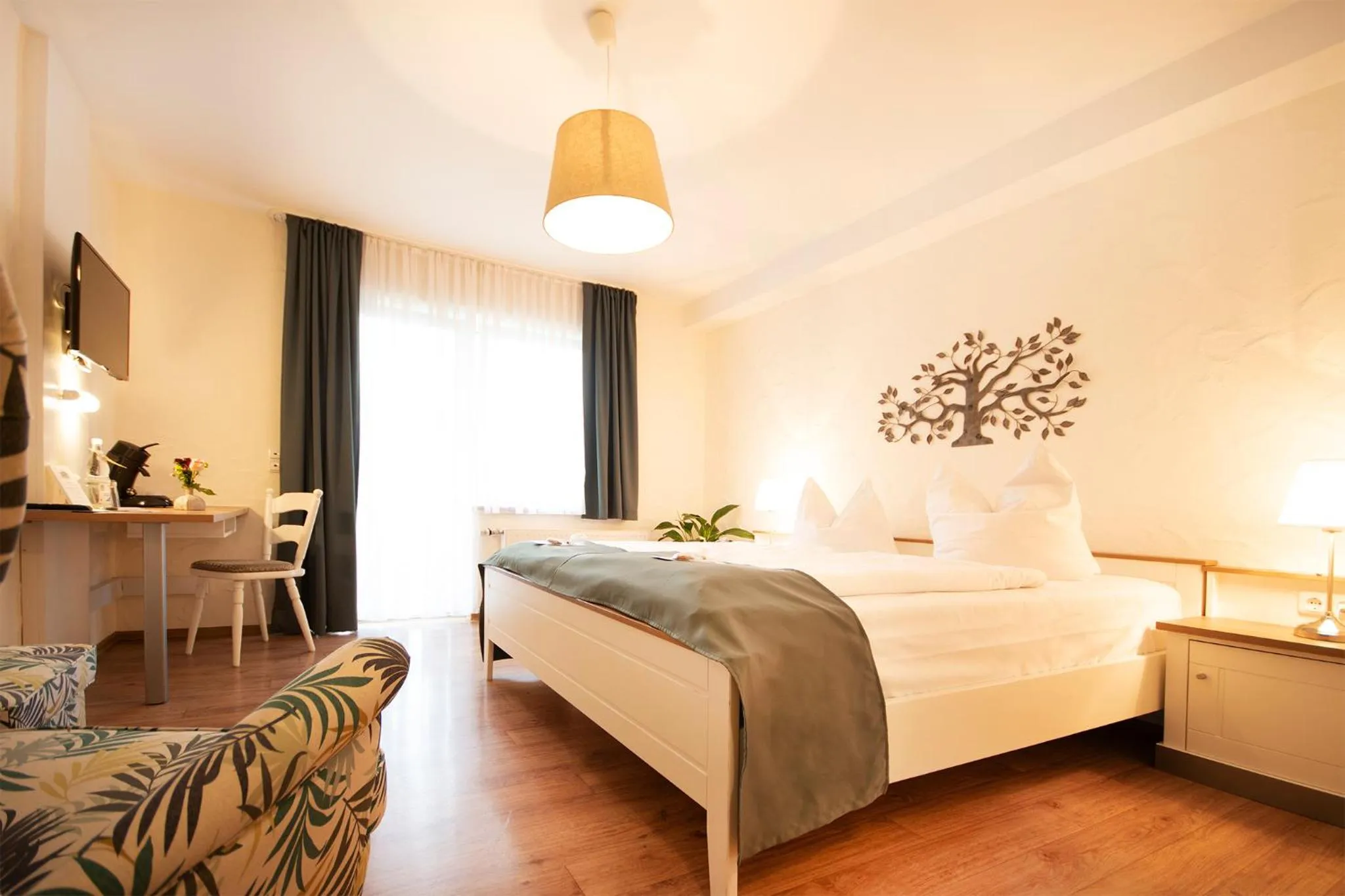 Bed in Brauers Landarthotel GmbH