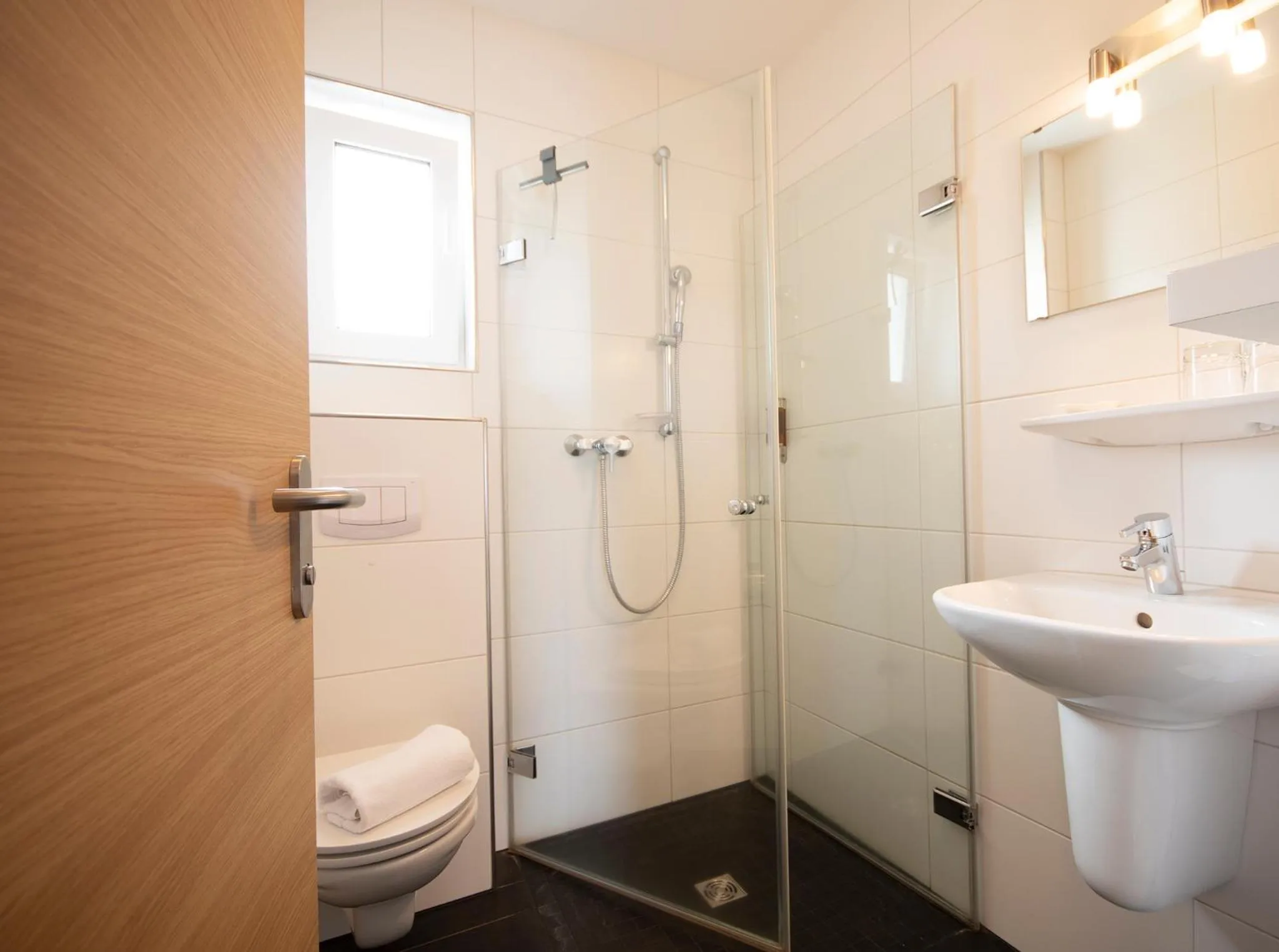 Bathroom in Brauers Landarthotel GmbH