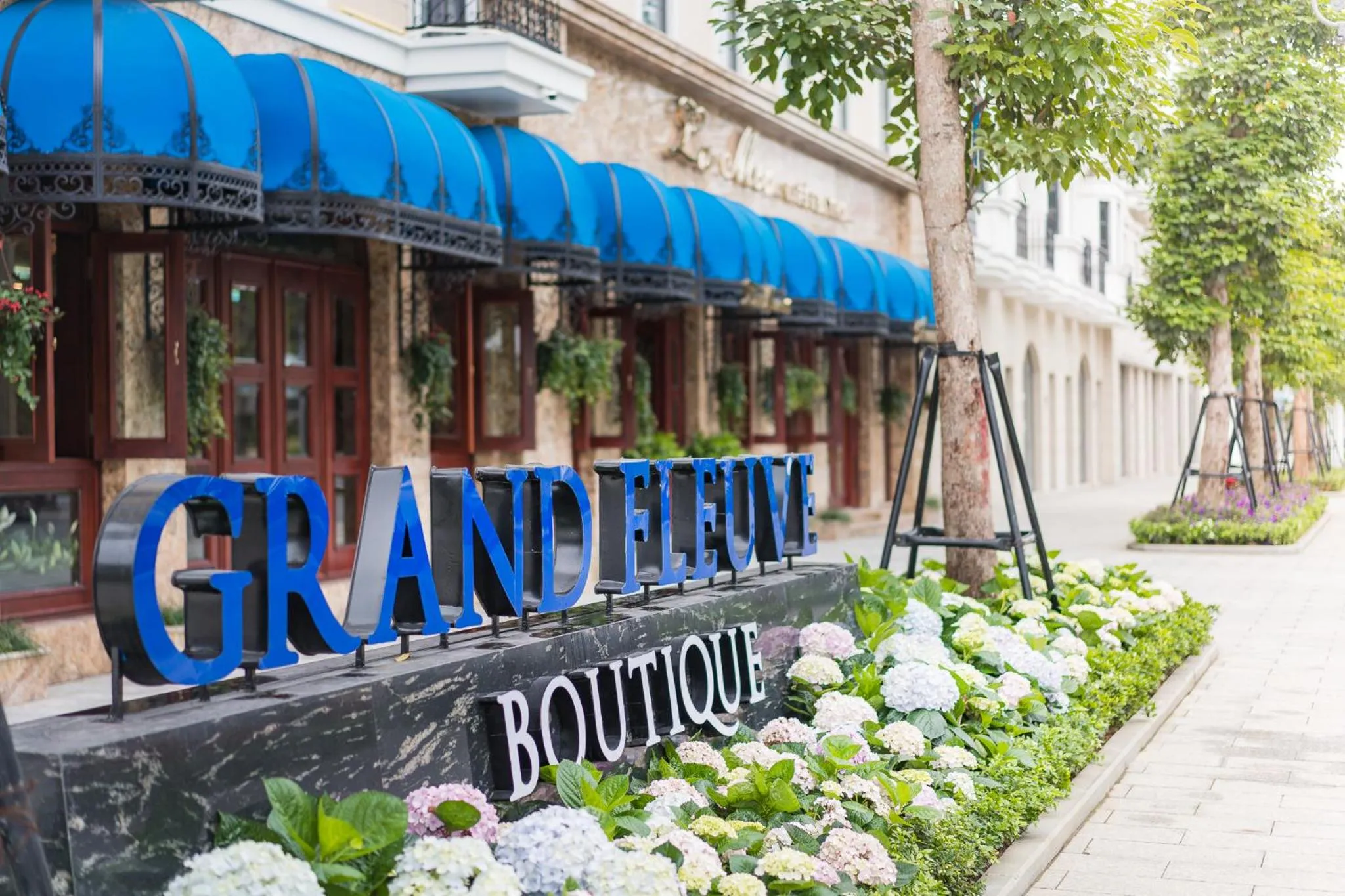 Property logo or sign in Grand Fleuve Boutique