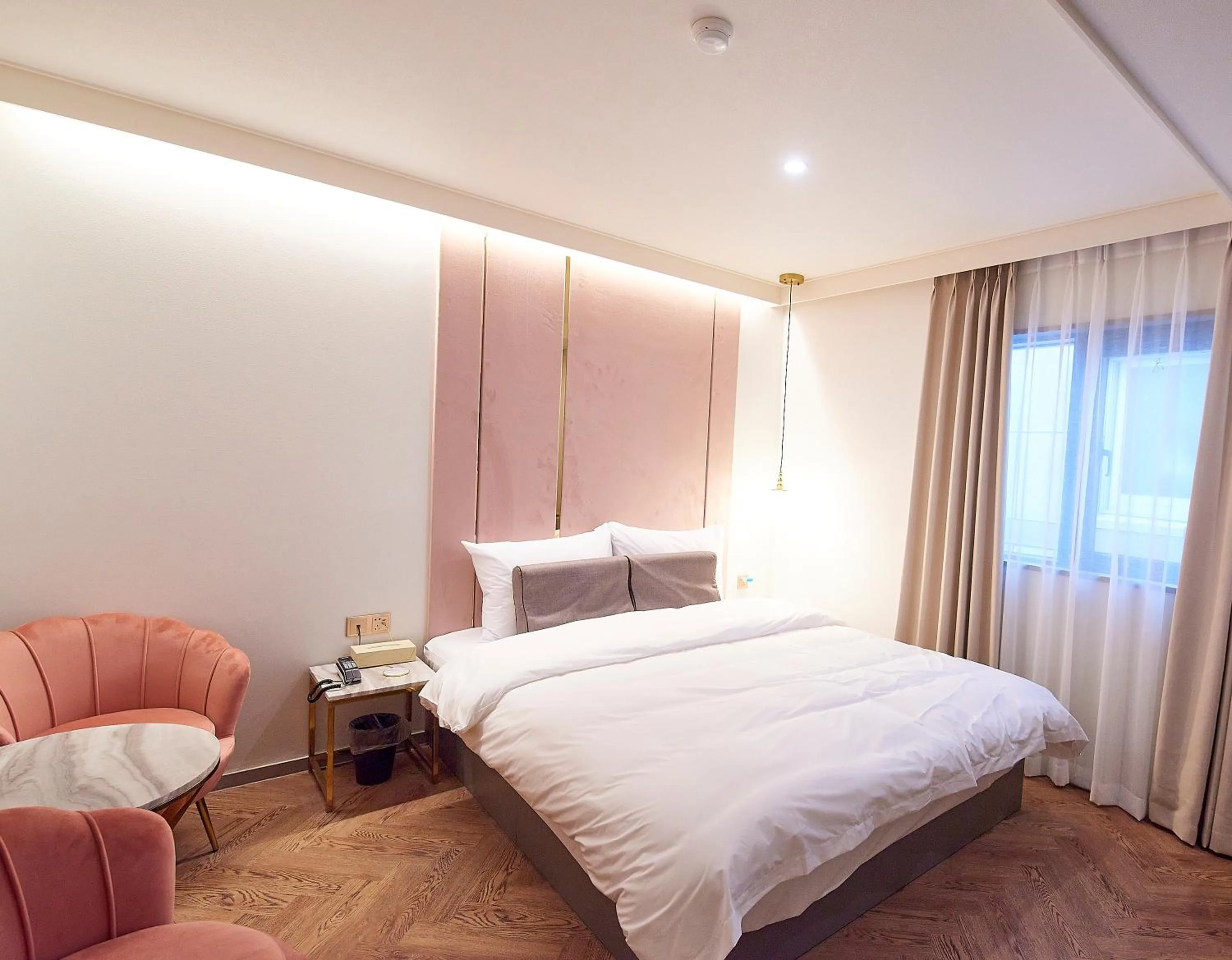 Bed in 사직 덴바스타 시그니처 호텔