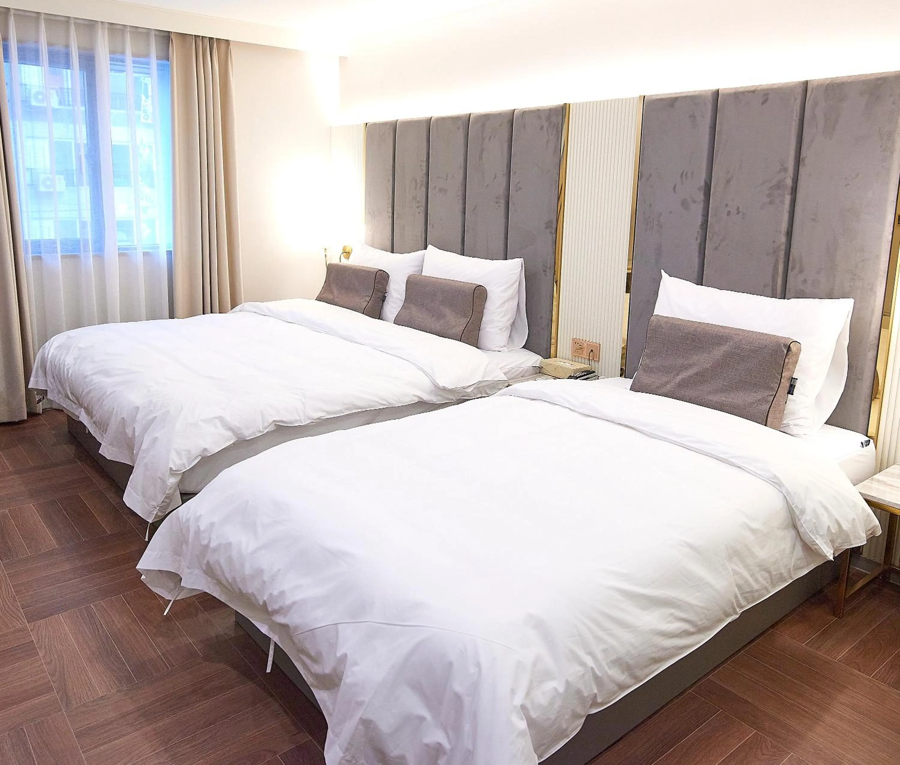 Bed in 사직 덴바스타 시그니처 호텔