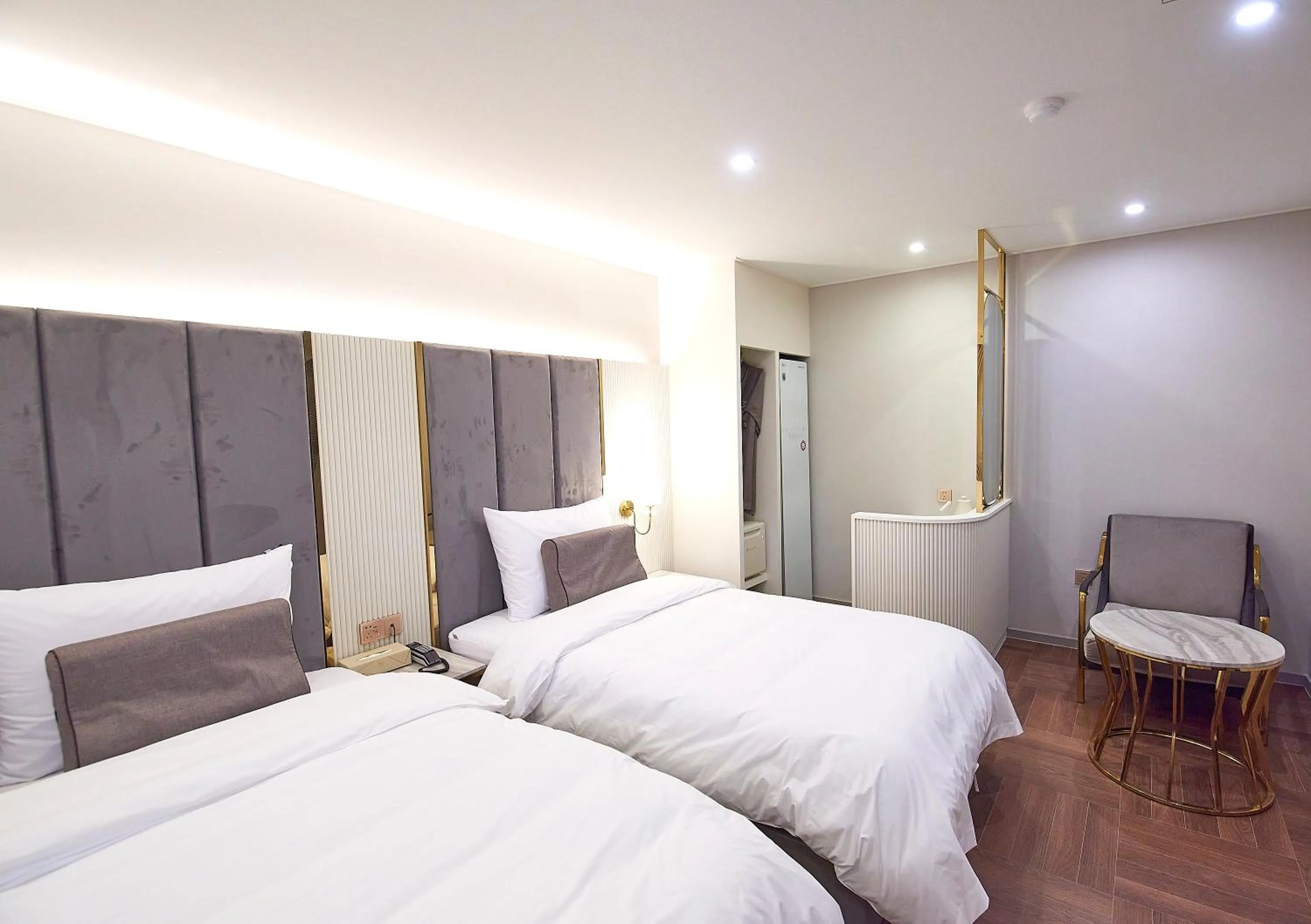 Bed in 사직 덴바스타 시그니처 호텔