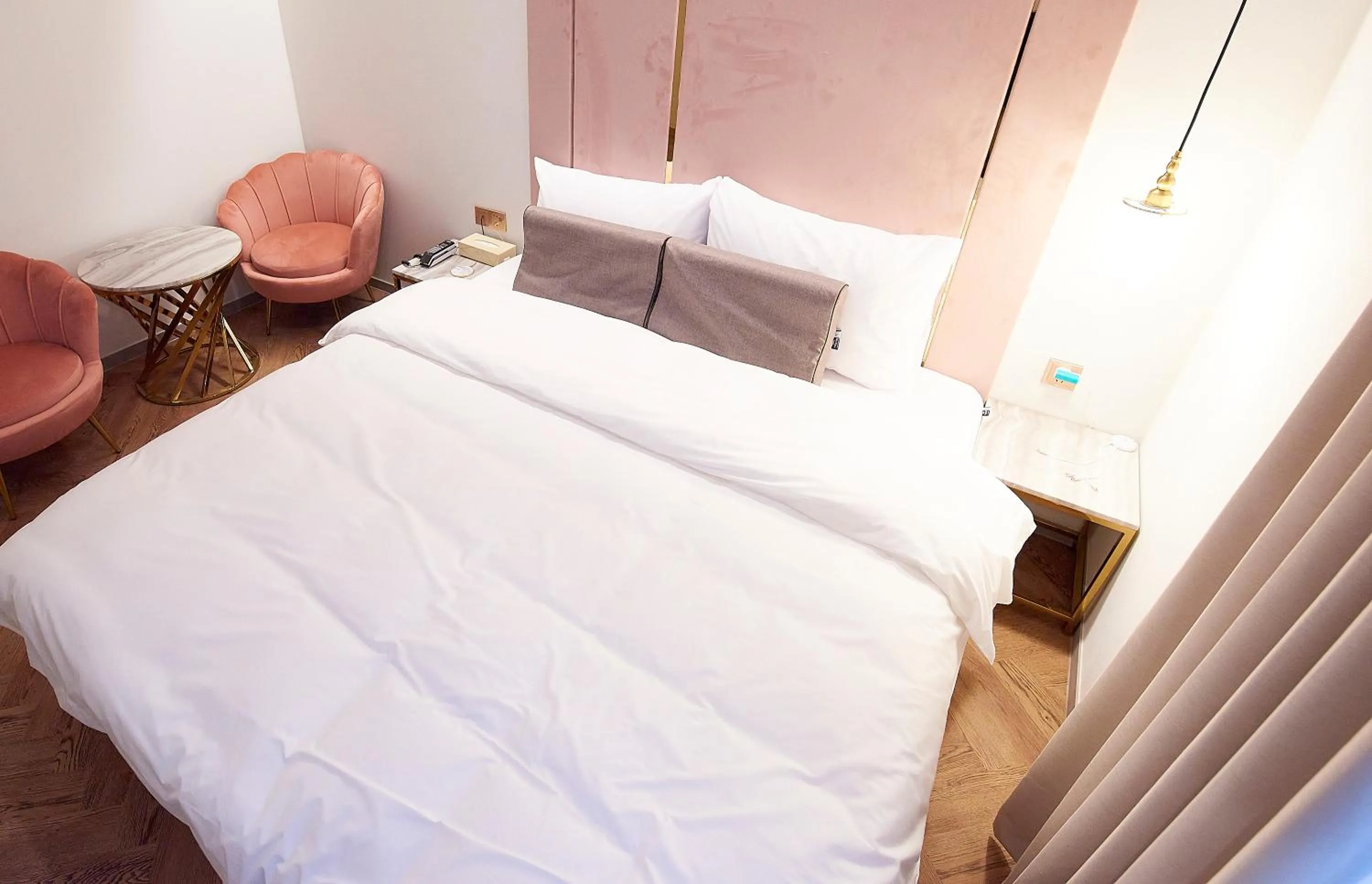 Bed in 사직 덴바스타 시그니처 호텔