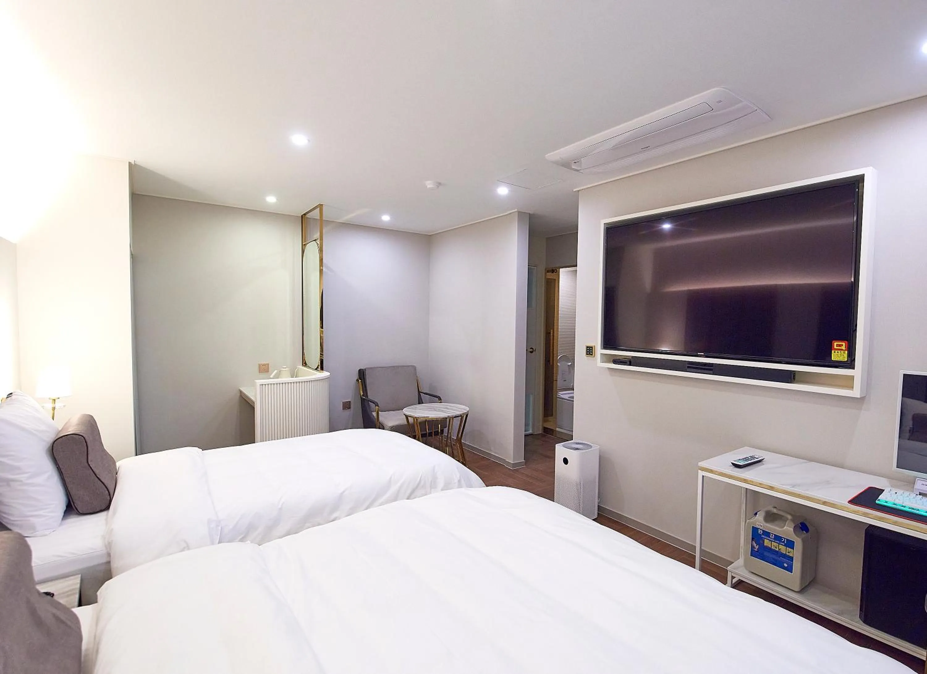 Bed in 사직 덴바스타 시그니처 호텔