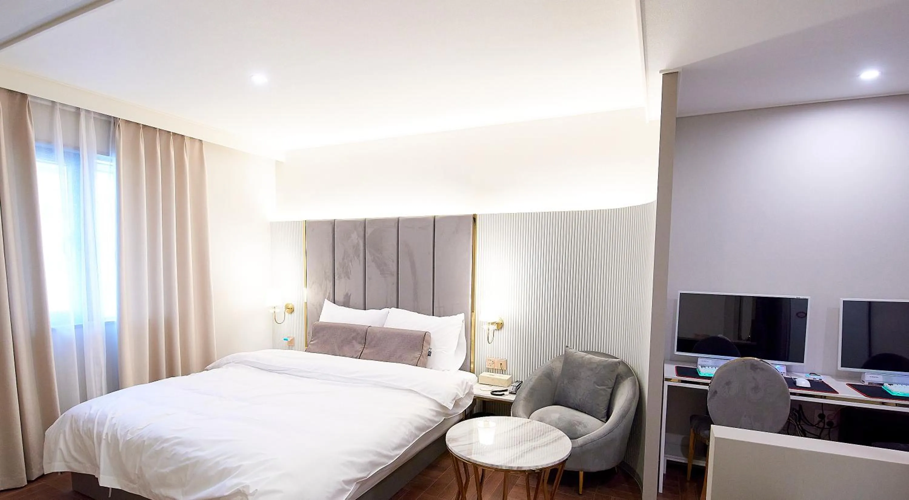 Bed in 사직 덴바스타 시그니처 호텔