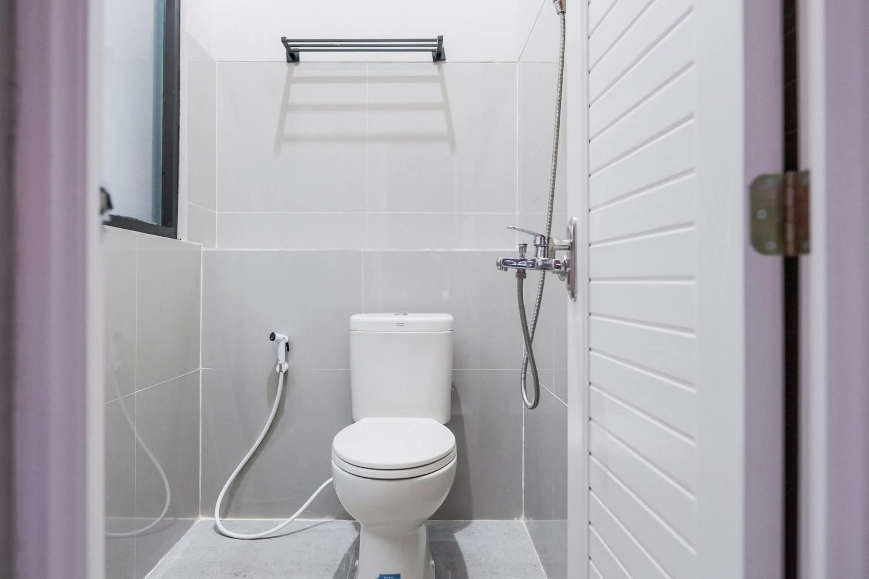 Bathroom in RedDoorz Syariah near Hajimena Lampung