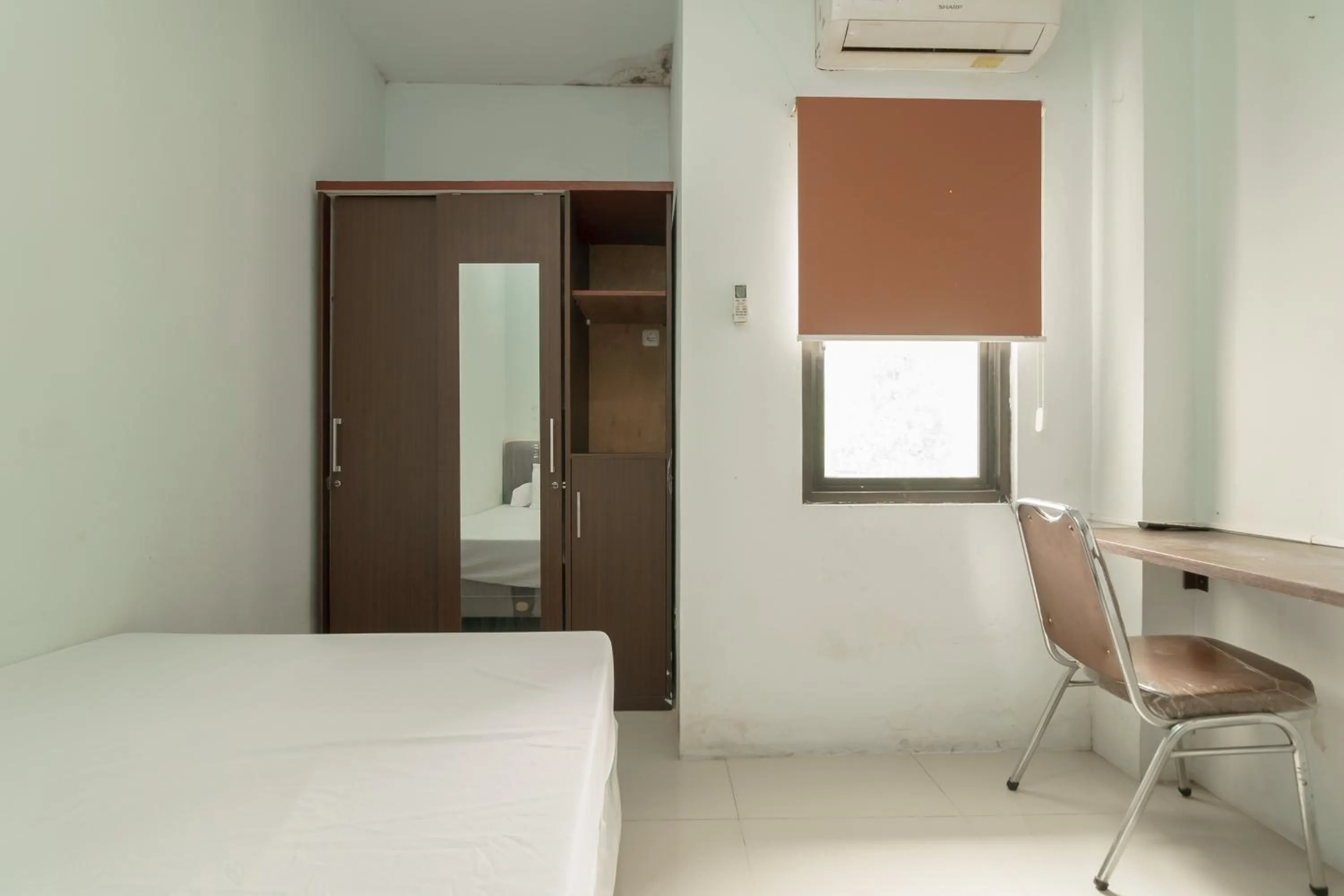 Bed in KoolKost Syariah near Kampus Utama Universitas Budi Luhur