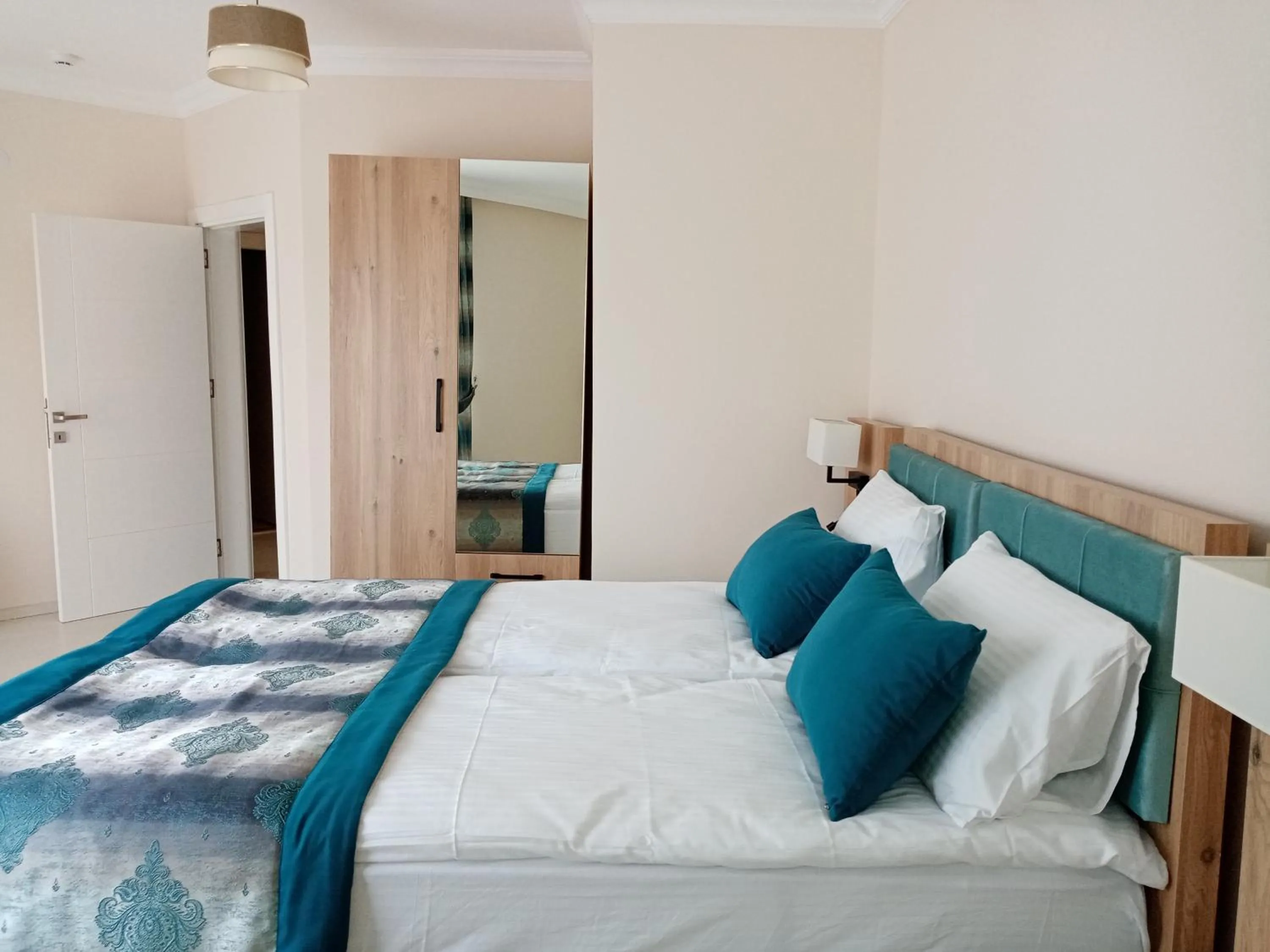 Bed in Alfa Apart Hotel