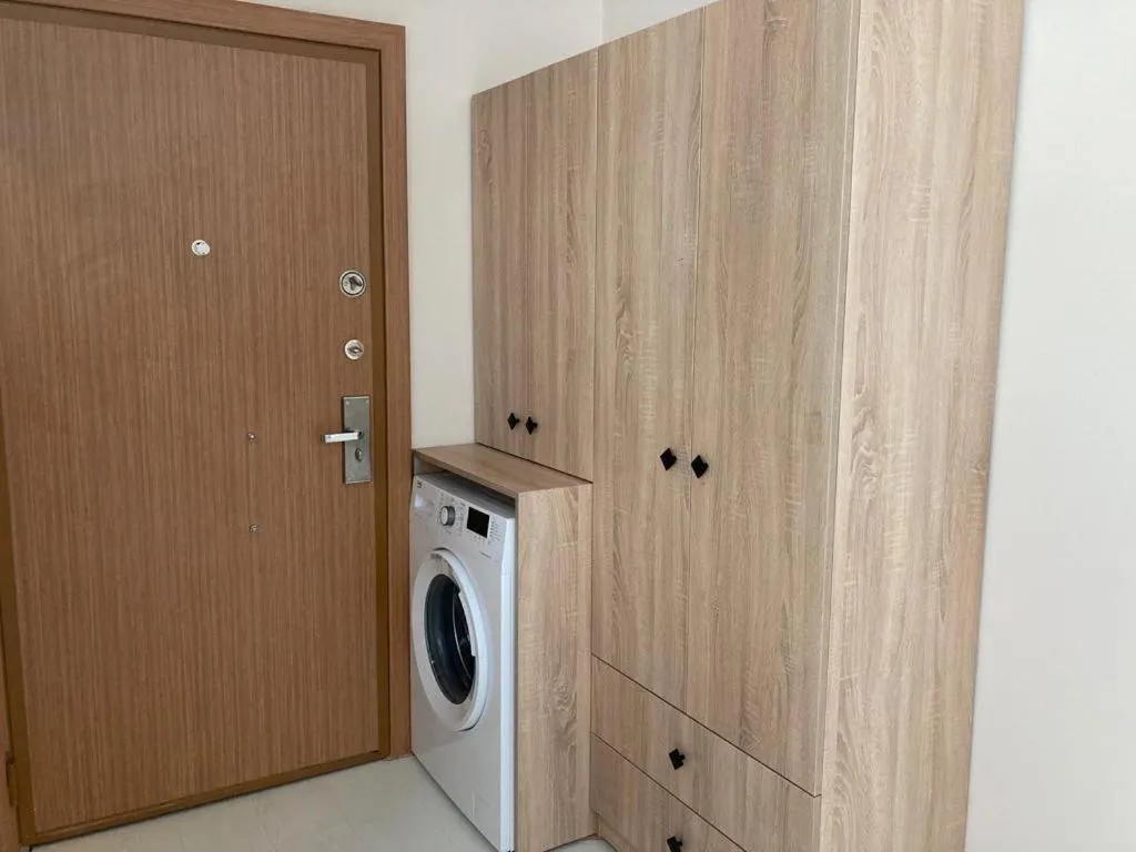 washing machine in Alfa Apart Hotel