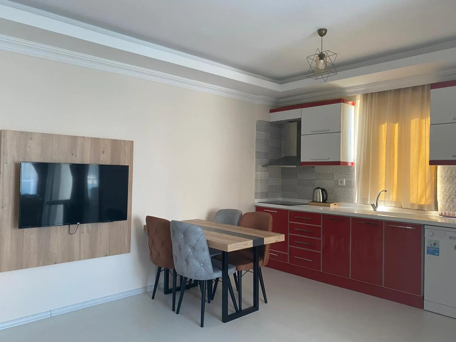 Kitchen or kitchenette in Alfa Apart Hotel