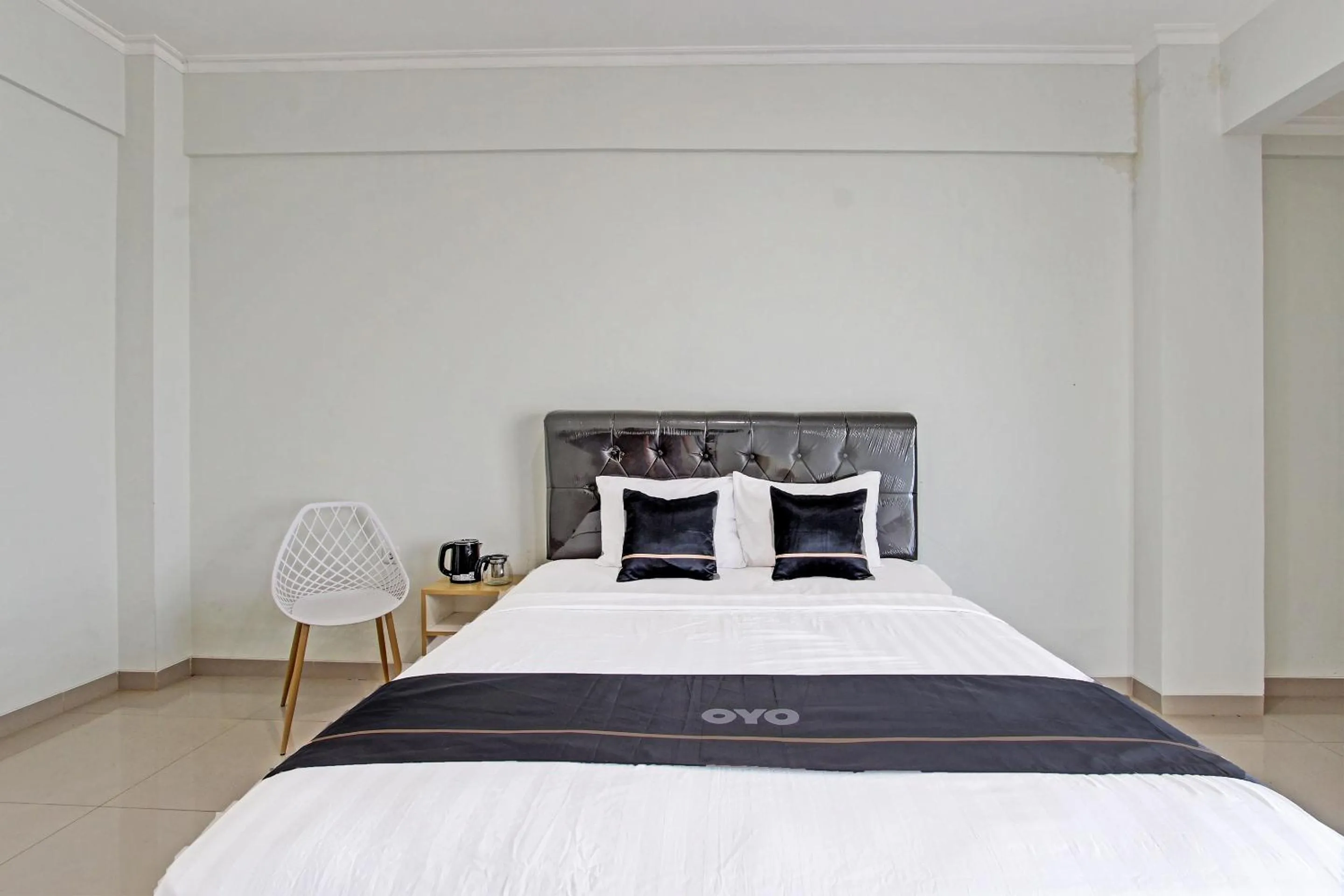 Bedroom in Capital O 91377 Mk Prime Syariah