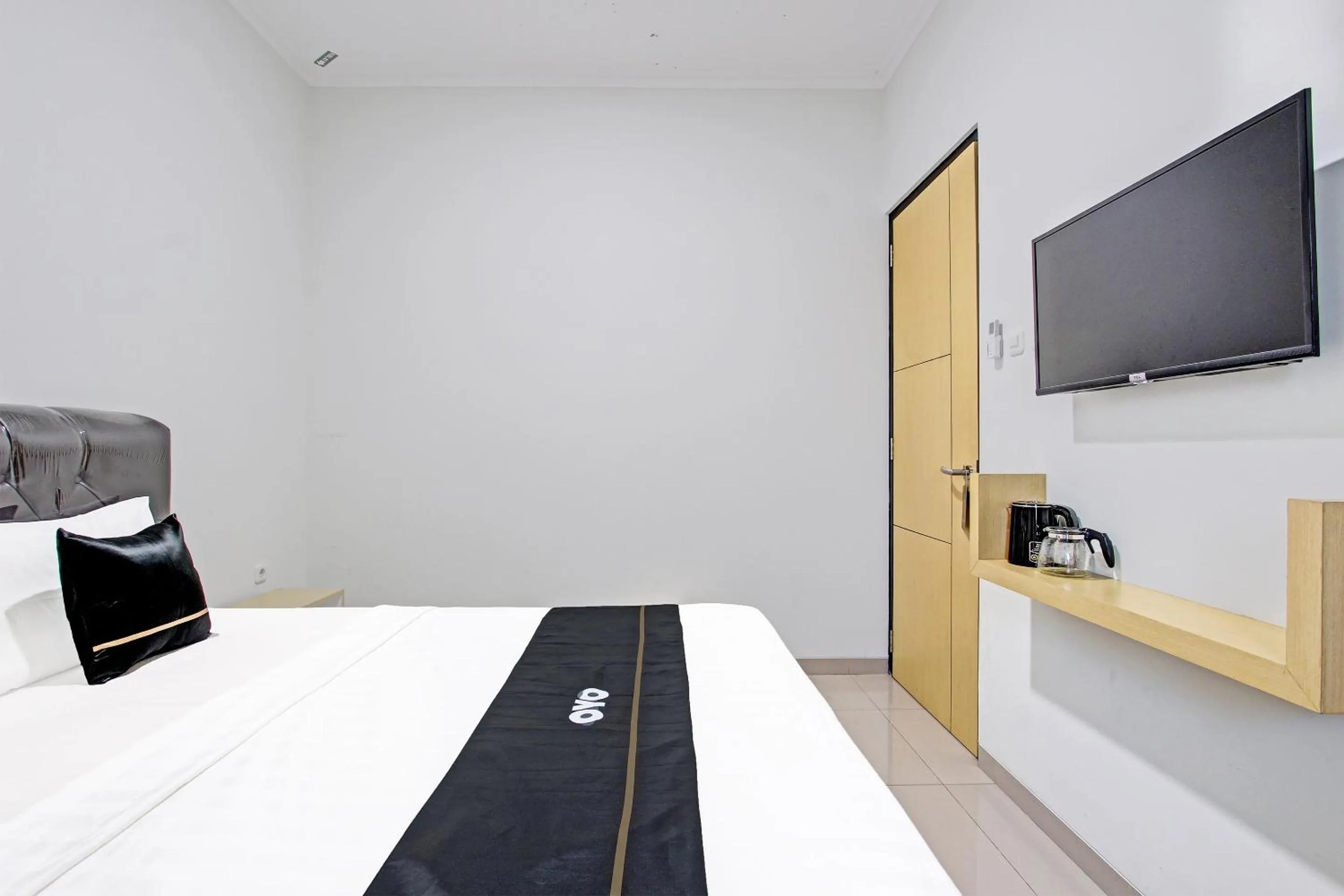 Bedroom in Capital O 91377 Mk Prime Syariah