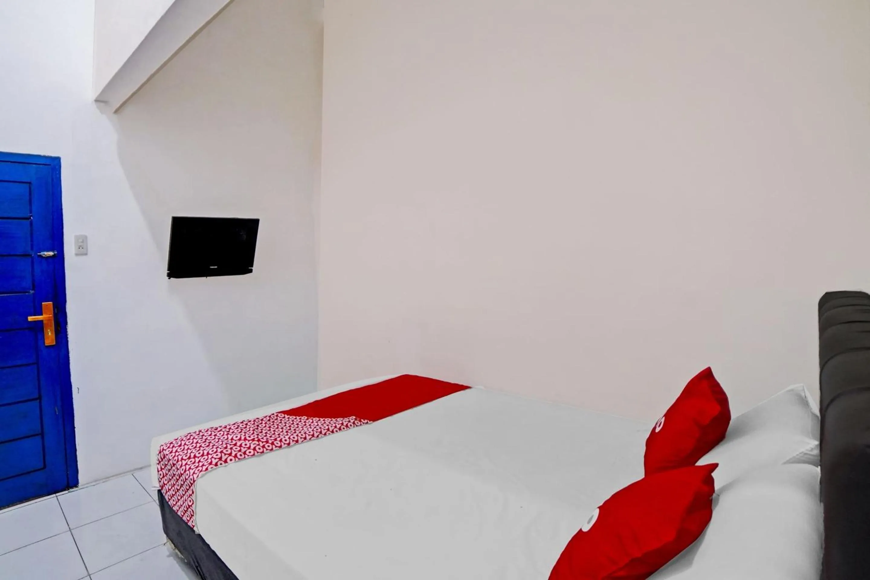 Bedroom in Hotel O Darussalam Inn