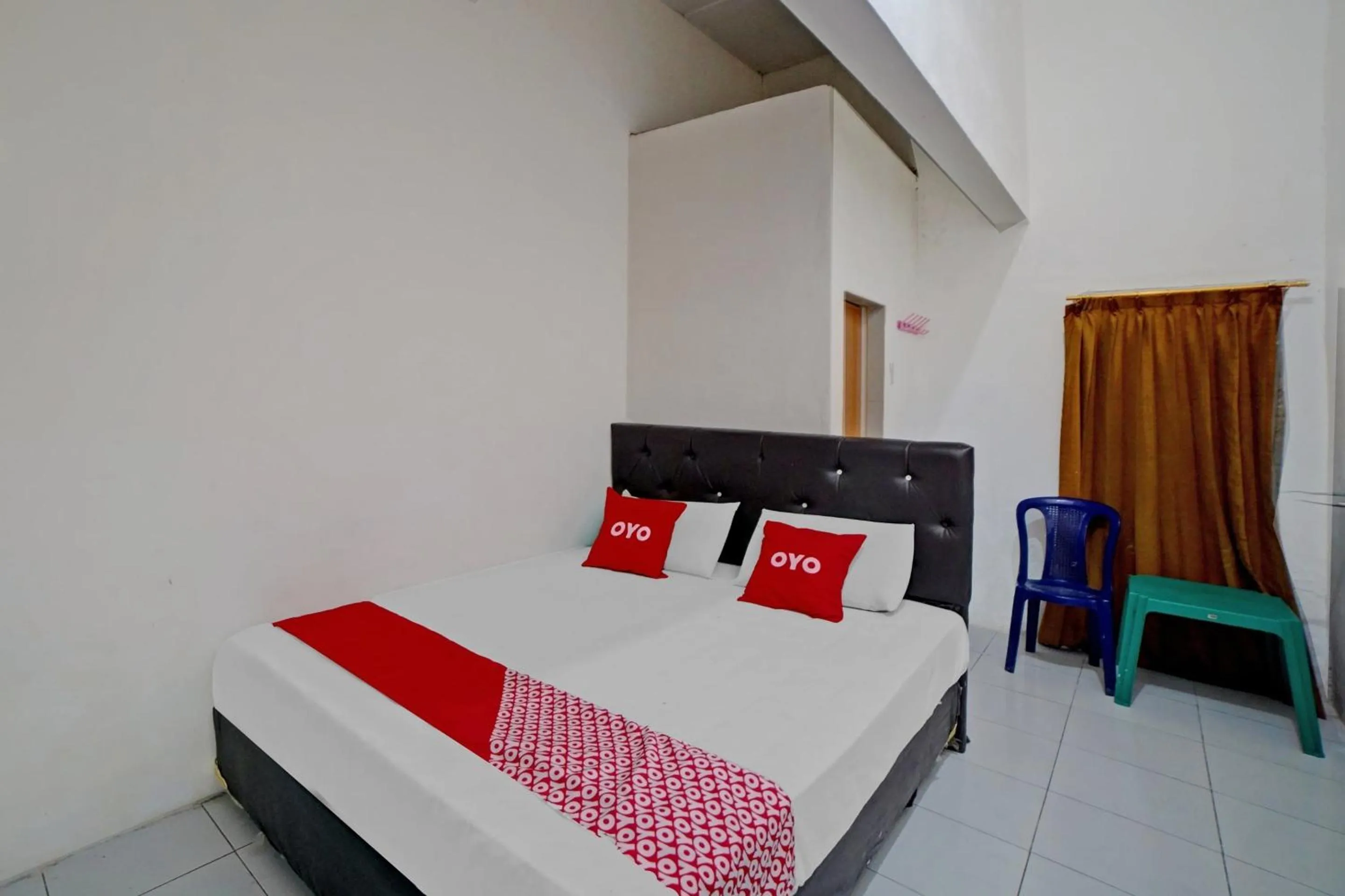 Bedroom in Hotel O Darussalam Inn