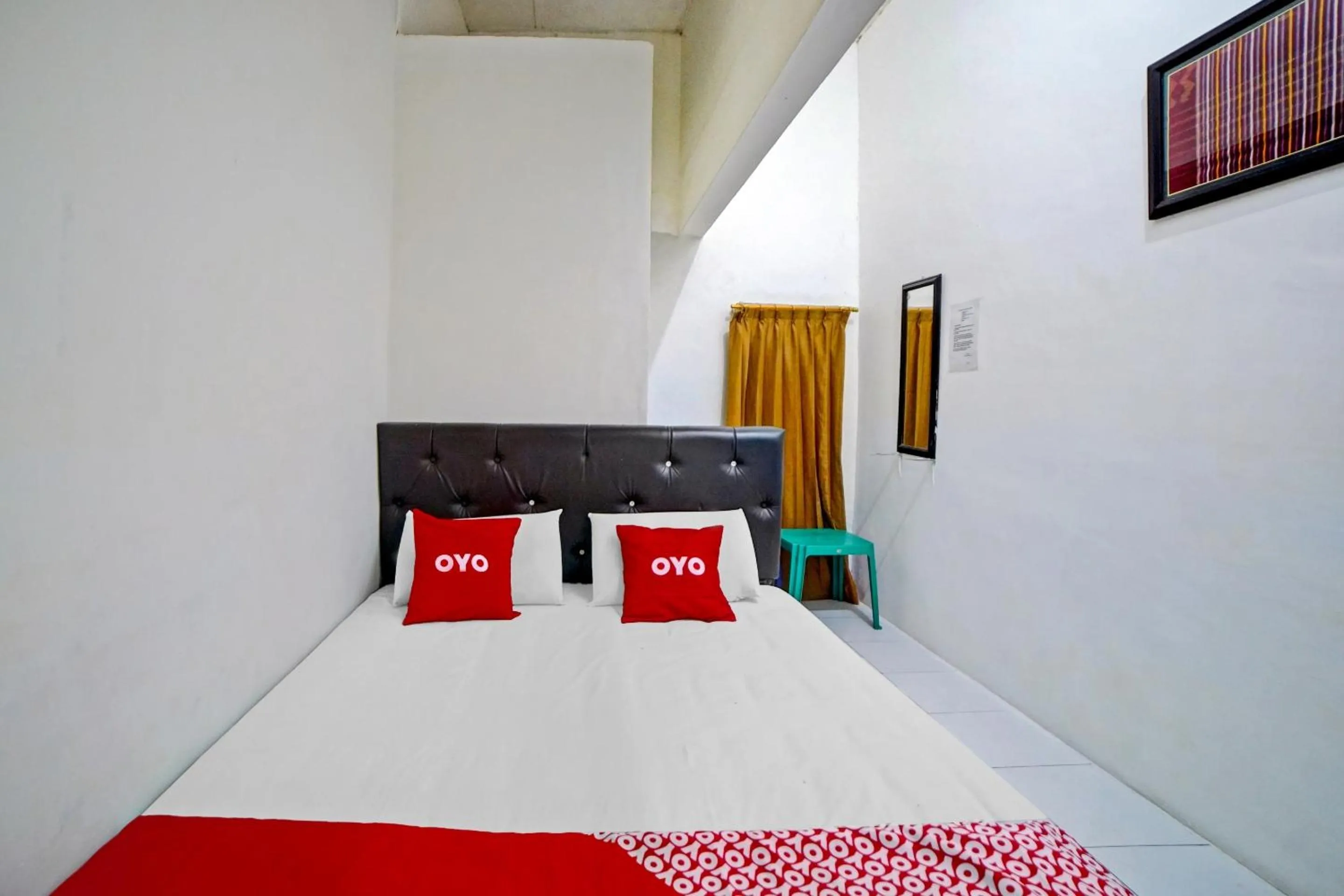 Bedroom in Hotel O Darussalam Inn