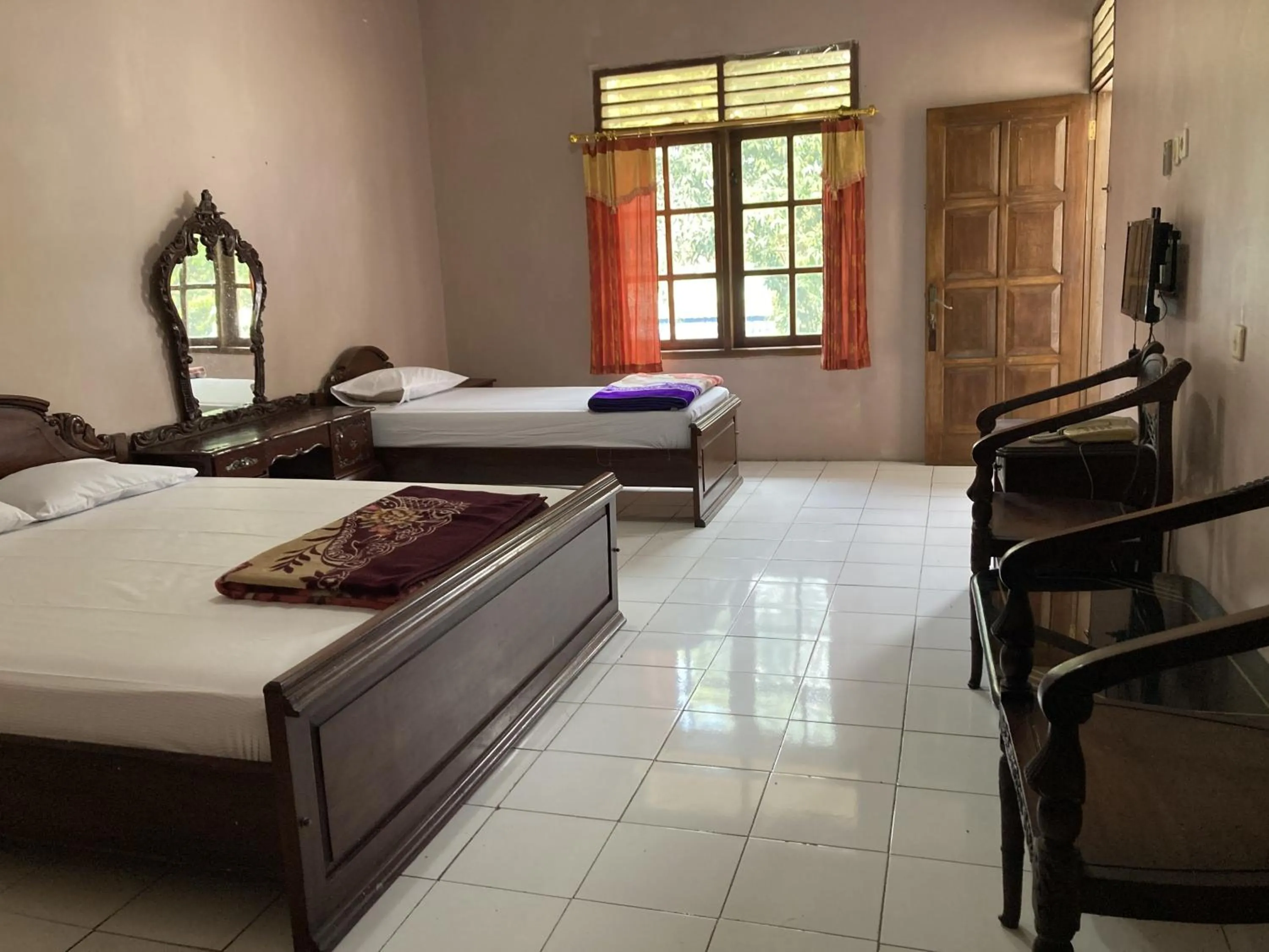 Bed in Hotel Garuda Syariah near Alun Alun Banjarnegara