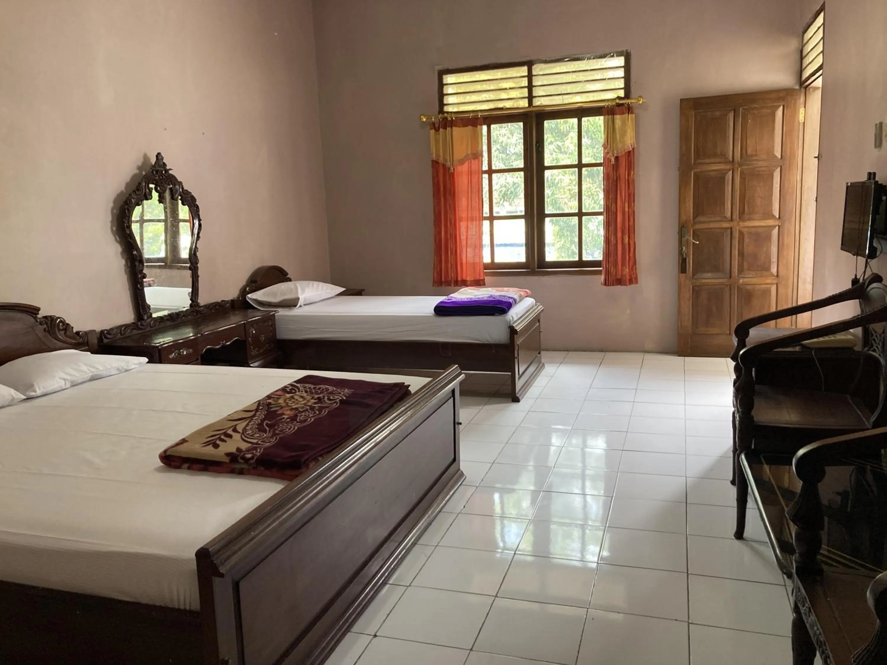 Bed in Hotel Garuda Syariah near Alun Alun Banjarnegara