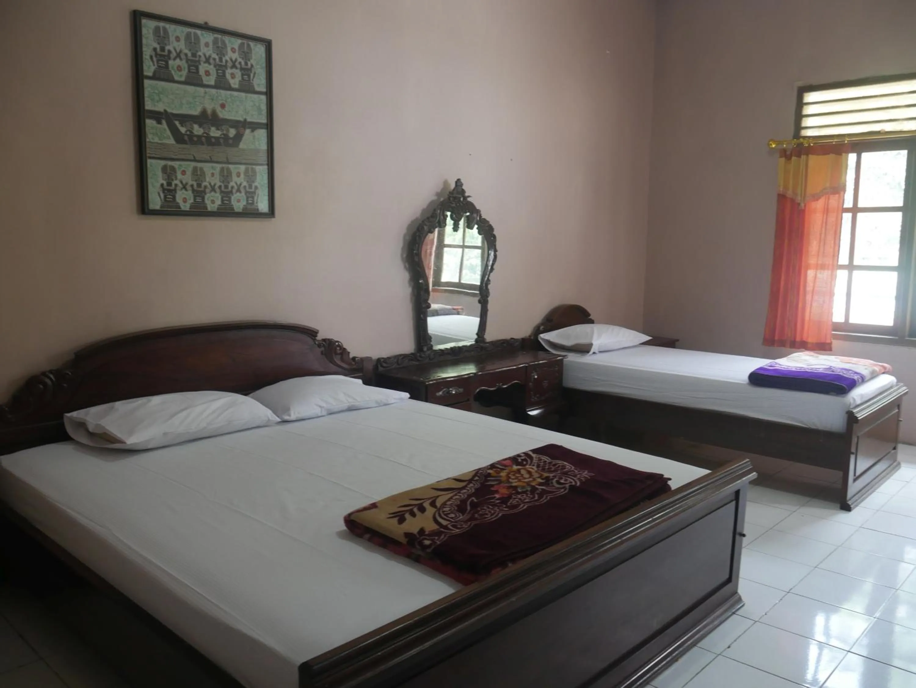 Bed in Hotel Garuda Syariah near Alun Alun Banjarnegara