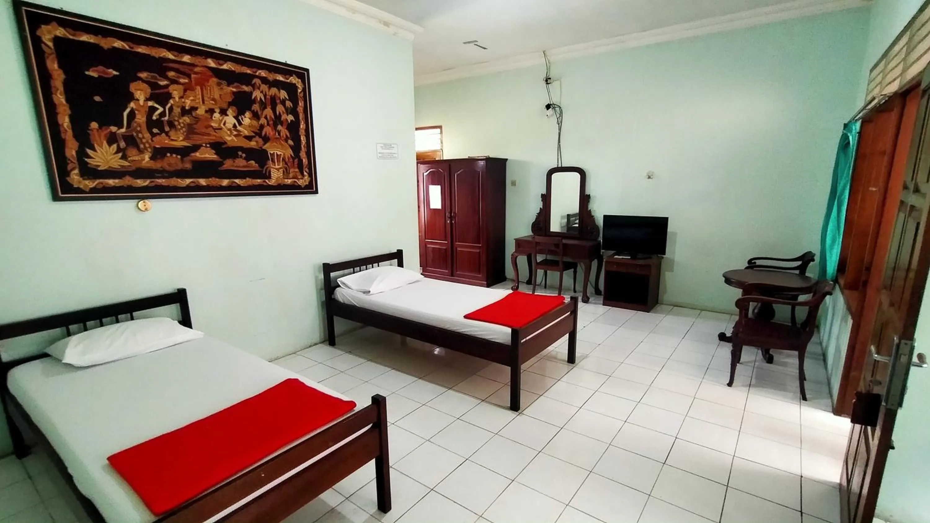 Bed in Hotel Garuda Syariah near Alun Alun Banjarnegara