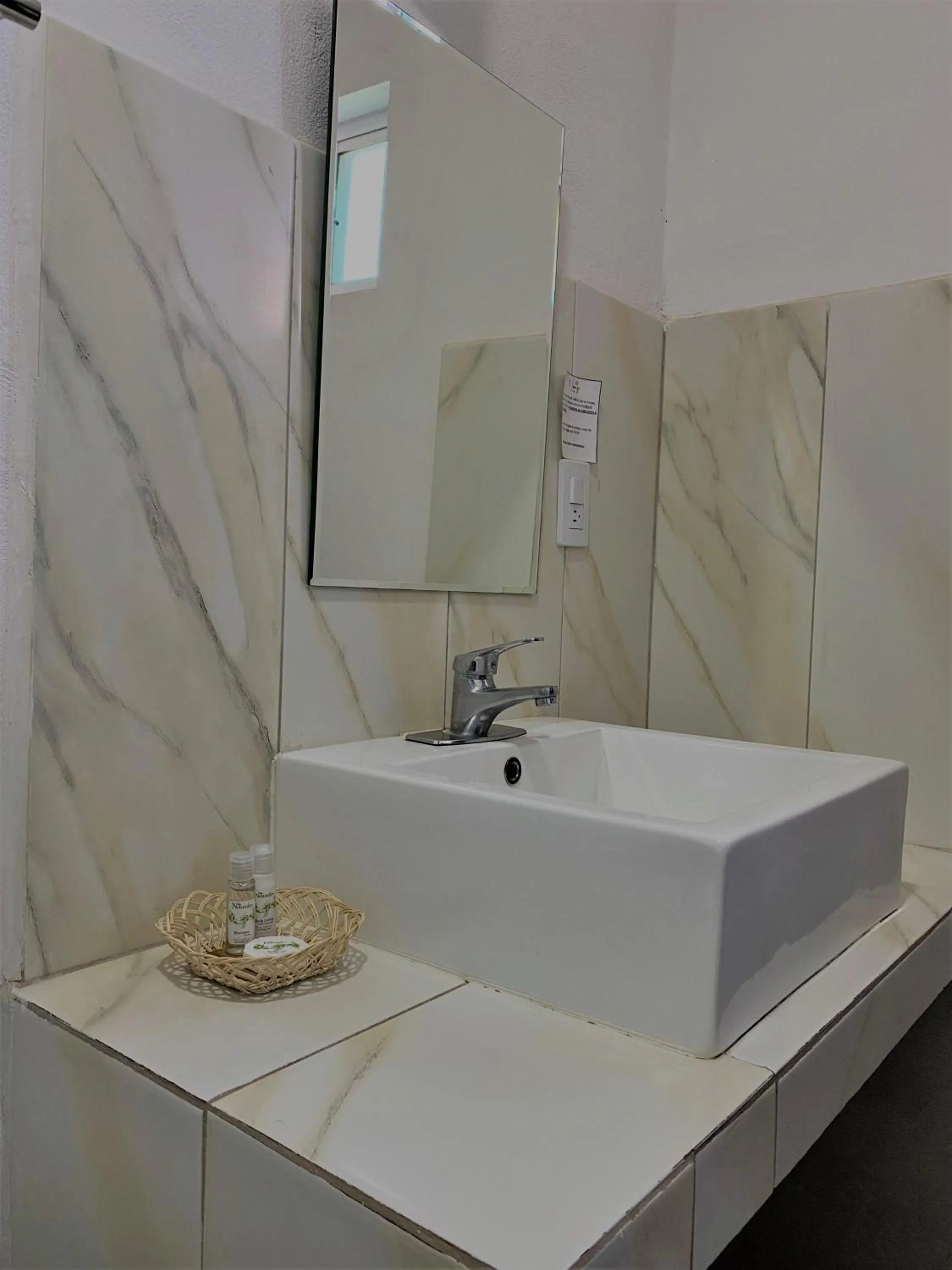 Bathroom in Noas Hotel