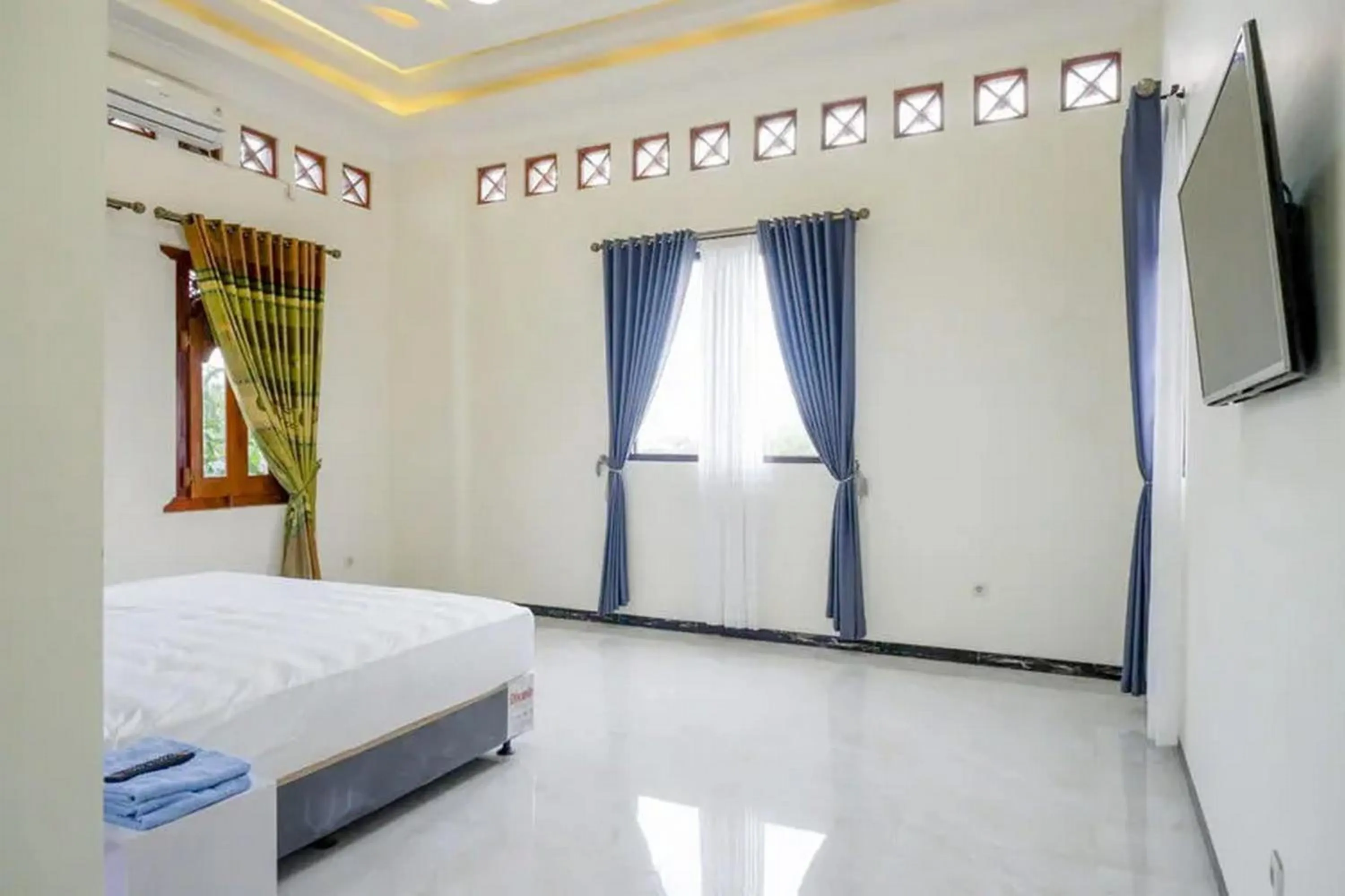 Bedroom, Bed in Griya Mataram Kotagede Mitra RedDoorz