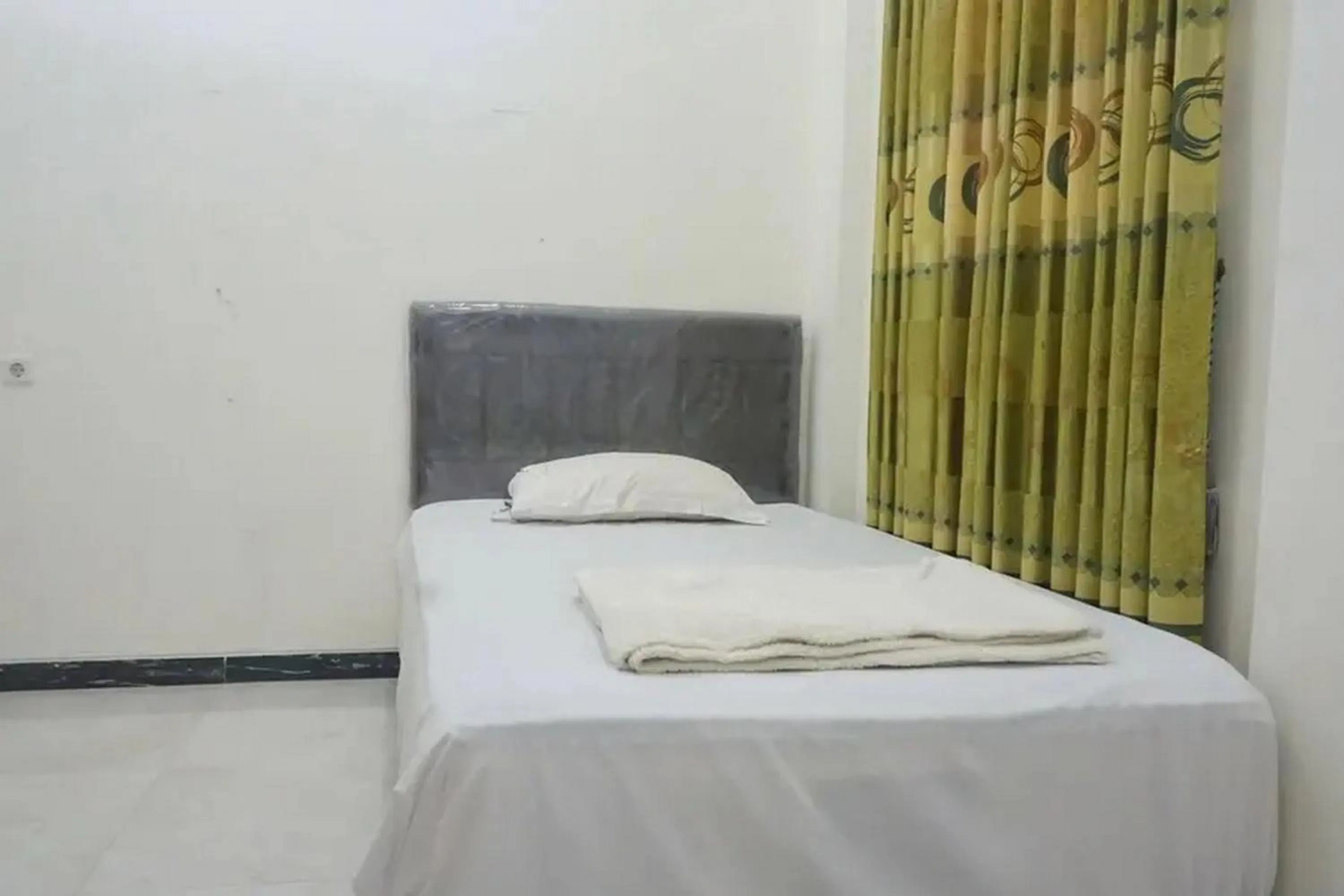 Bedroom, Bed in Griya Mataram Kotagede Mitra RedDoorz