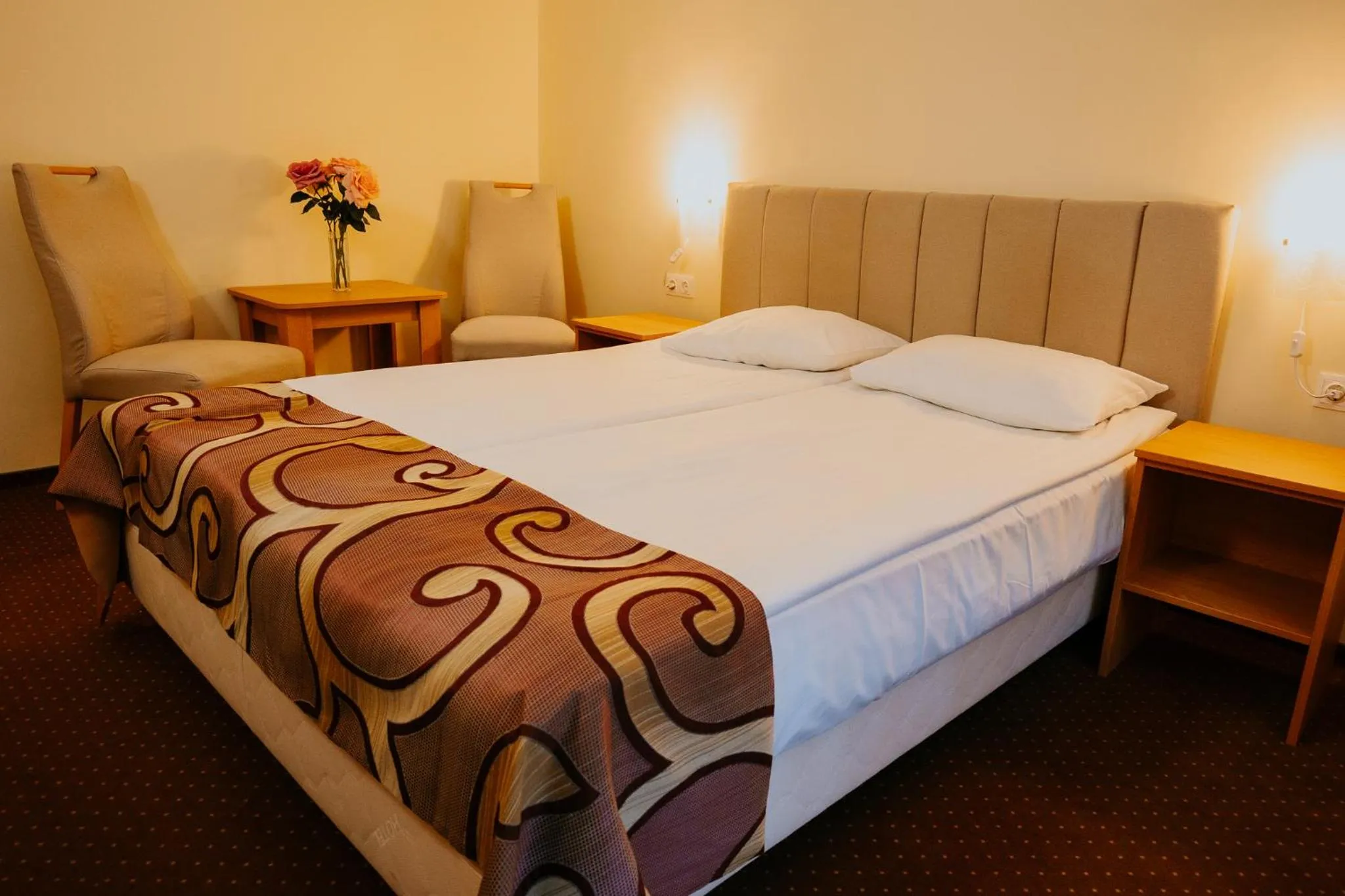 Bed in Hotel Tusnad