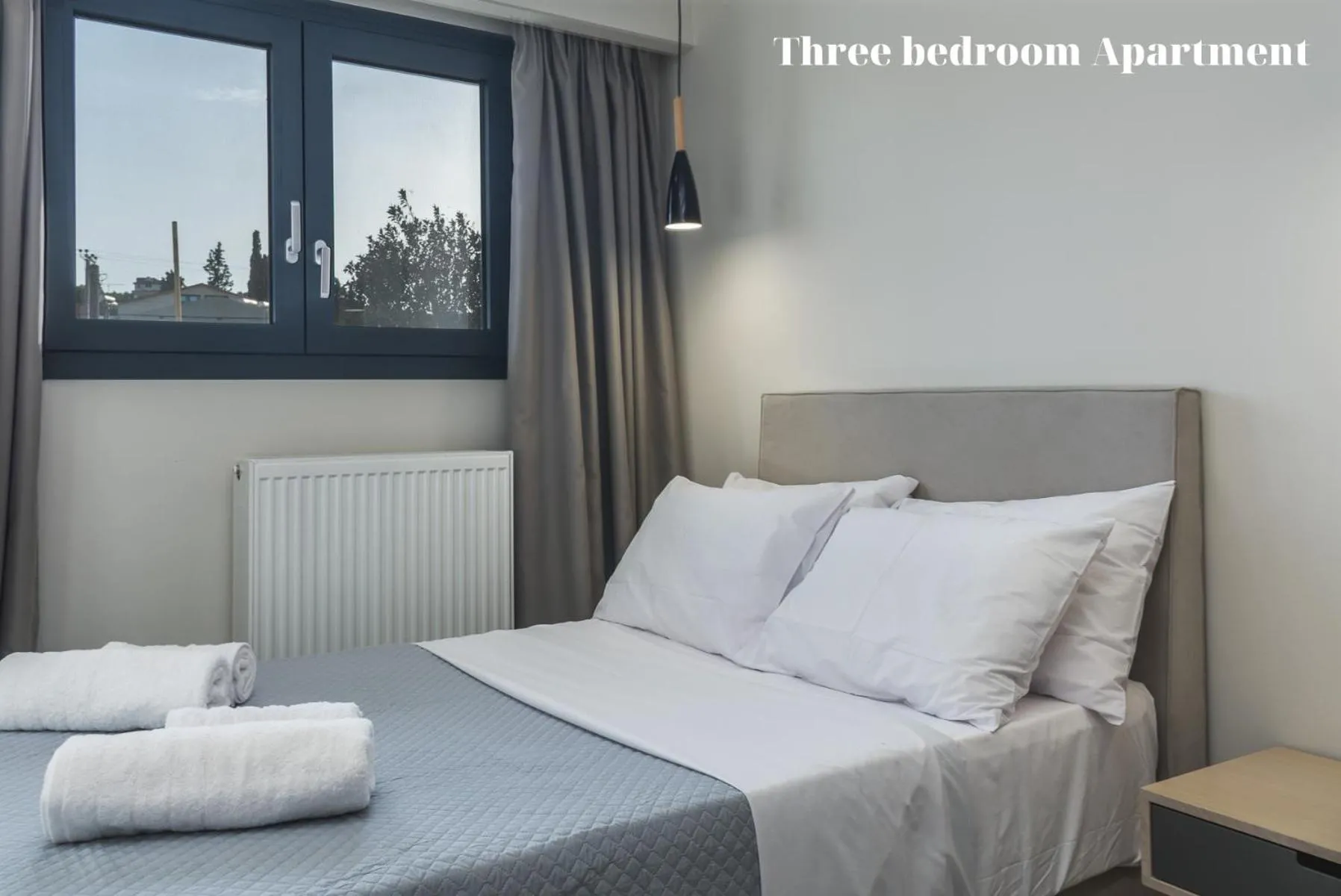Bed in Dionisos Luxury Suites
