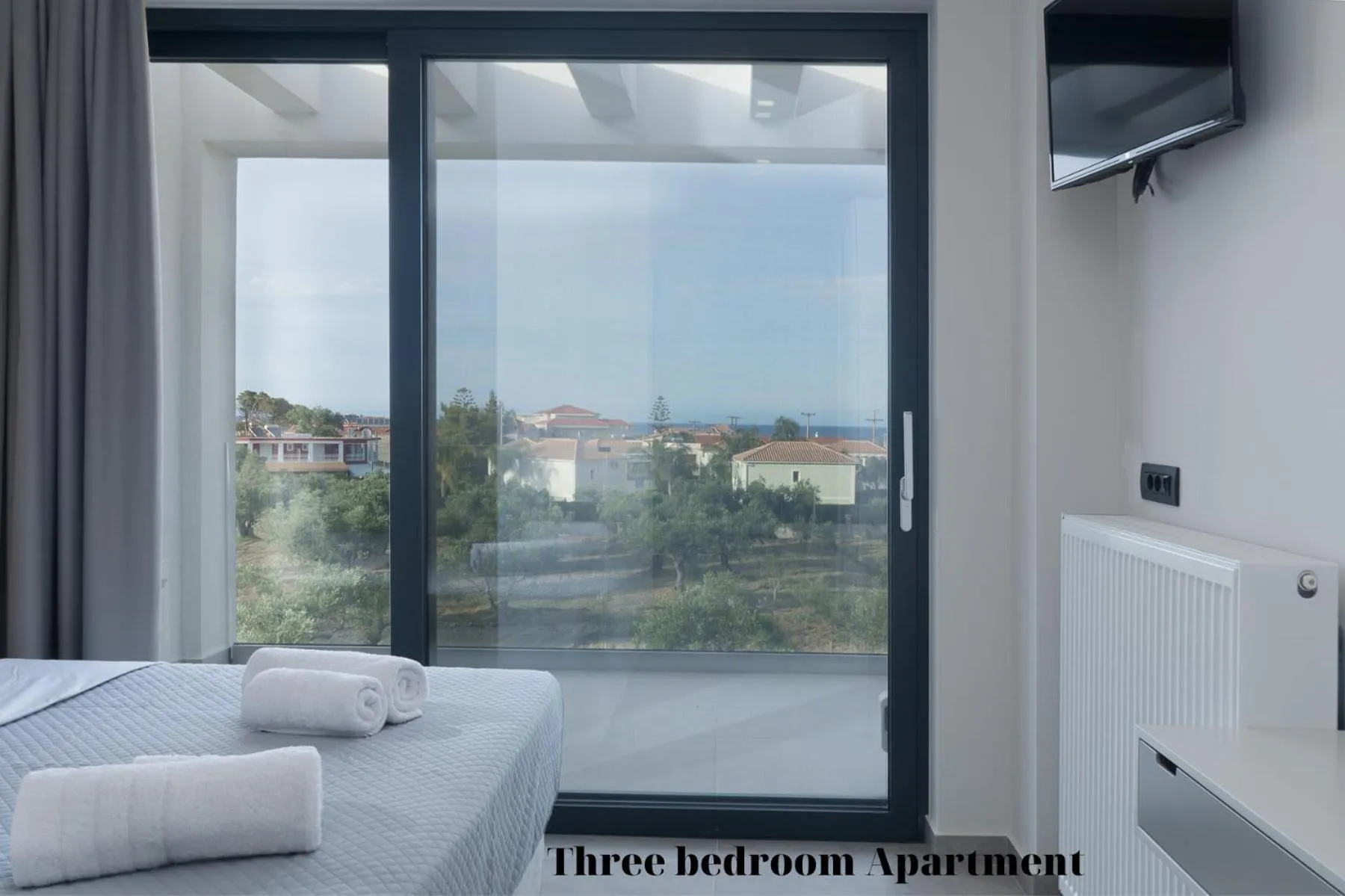 Bed in Dionisos Luxury Suites