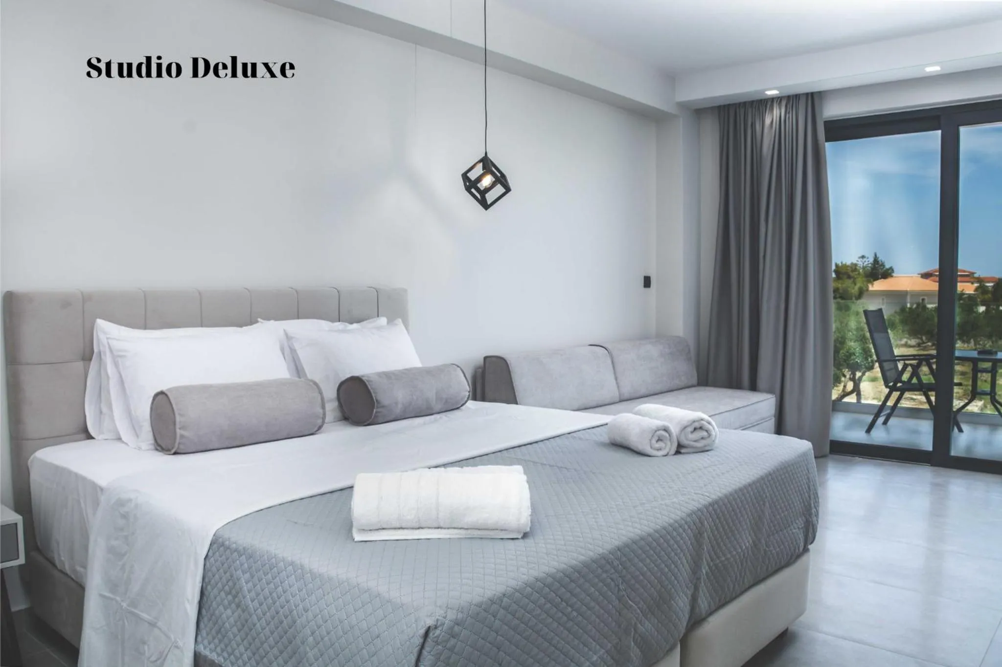 Bed in Dionisos Luxury Suites