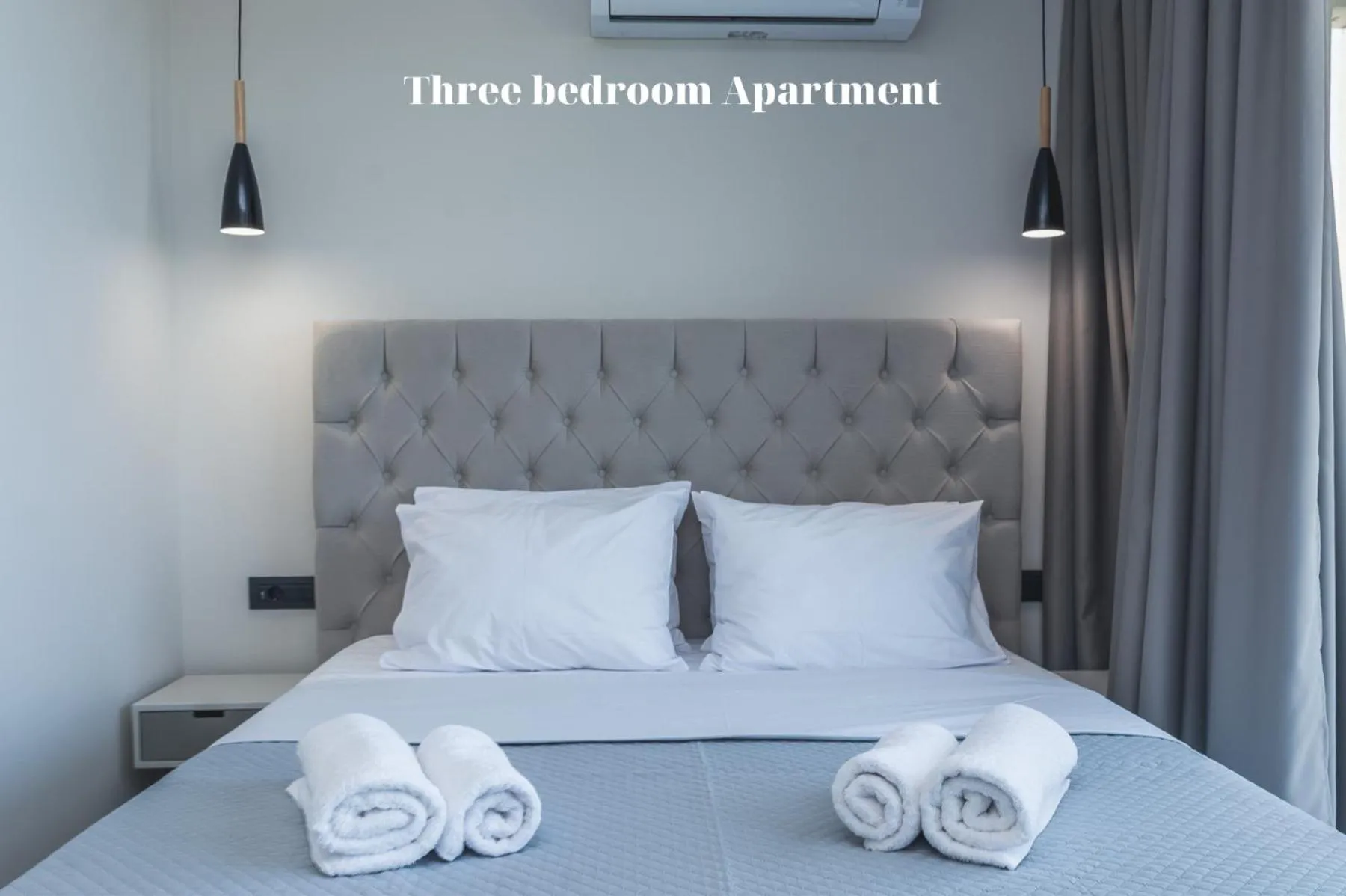Bed in Dionisos Luxury Suites