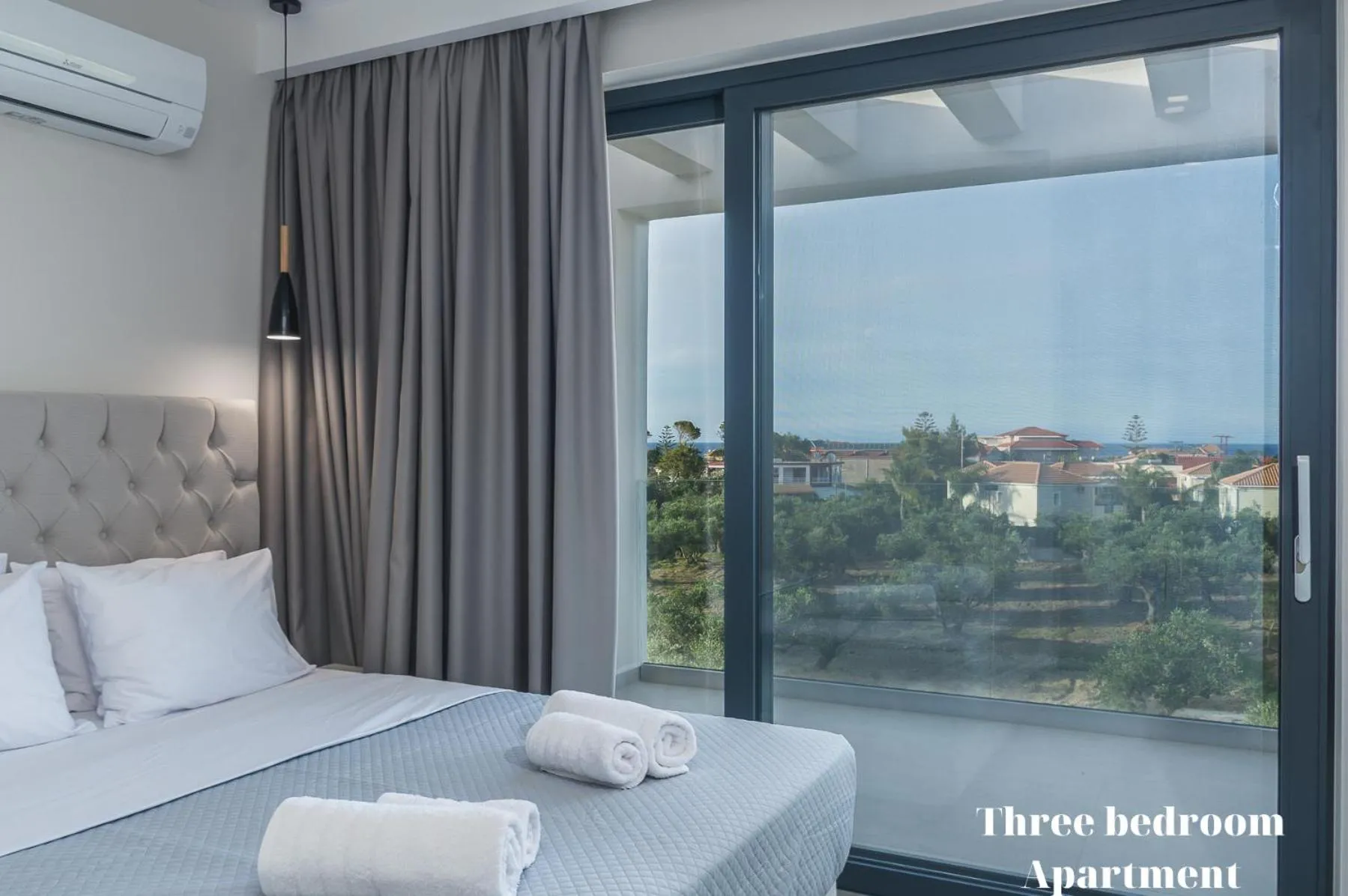Bed in Dionisos Luxury Suites