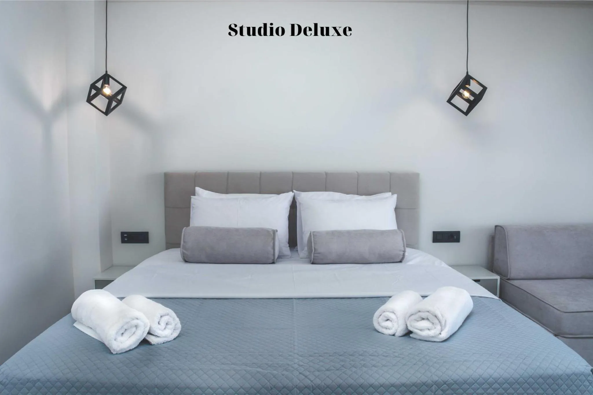Bed in Dionisos Luxury Suites