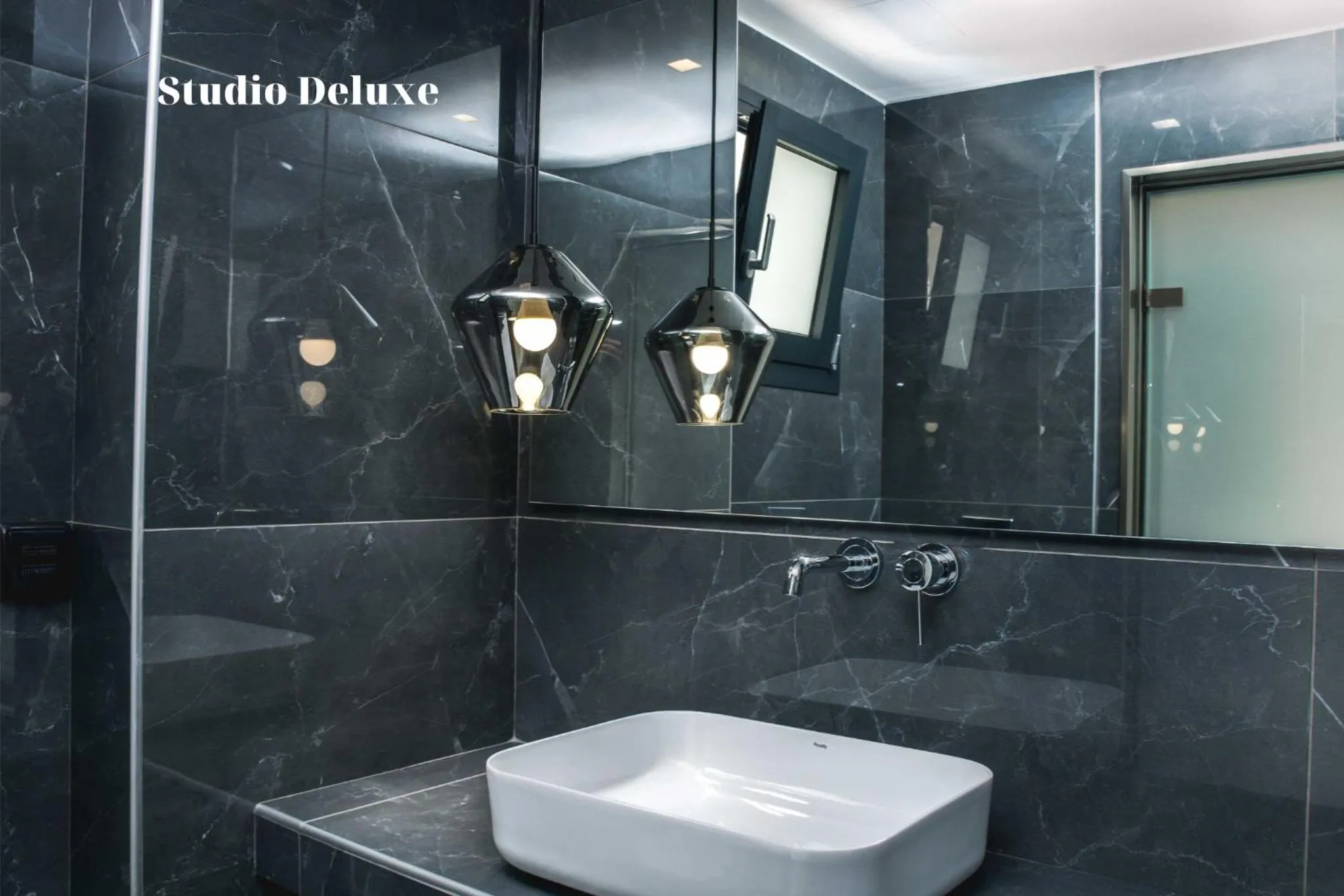 Shower in Dionisos Luxury Suites