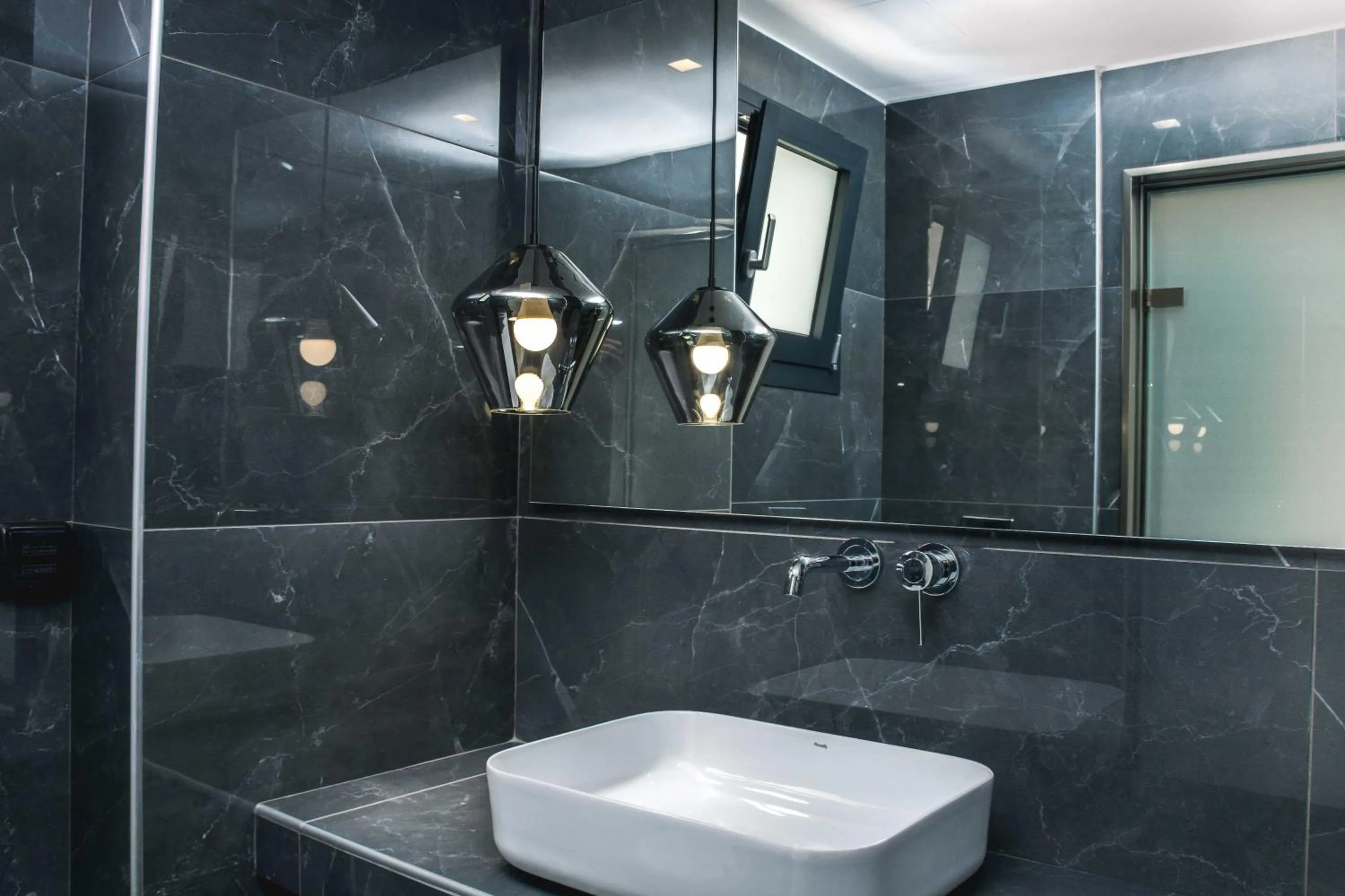 Shower in Dionisos Luxury Suites