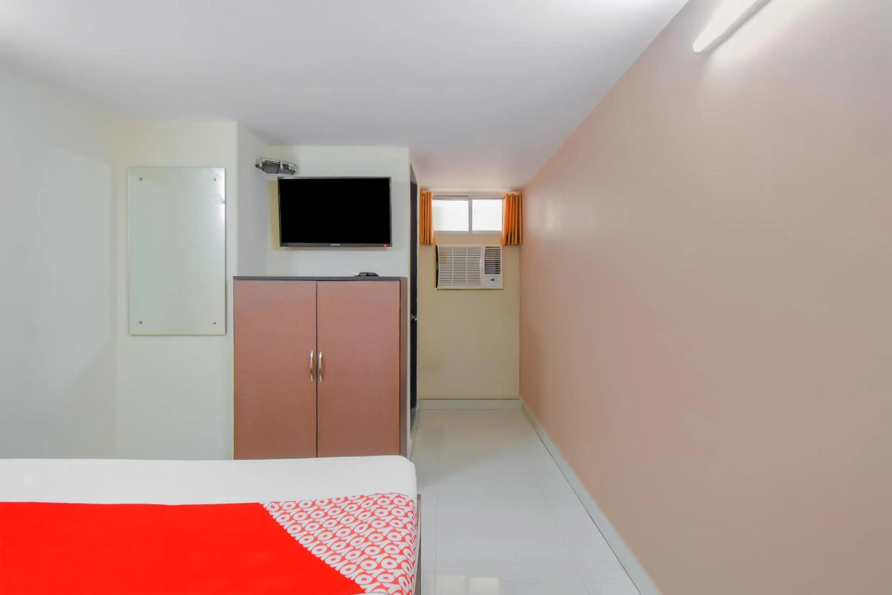 Bedroom in Hotel O Lindsay Inn Guest House