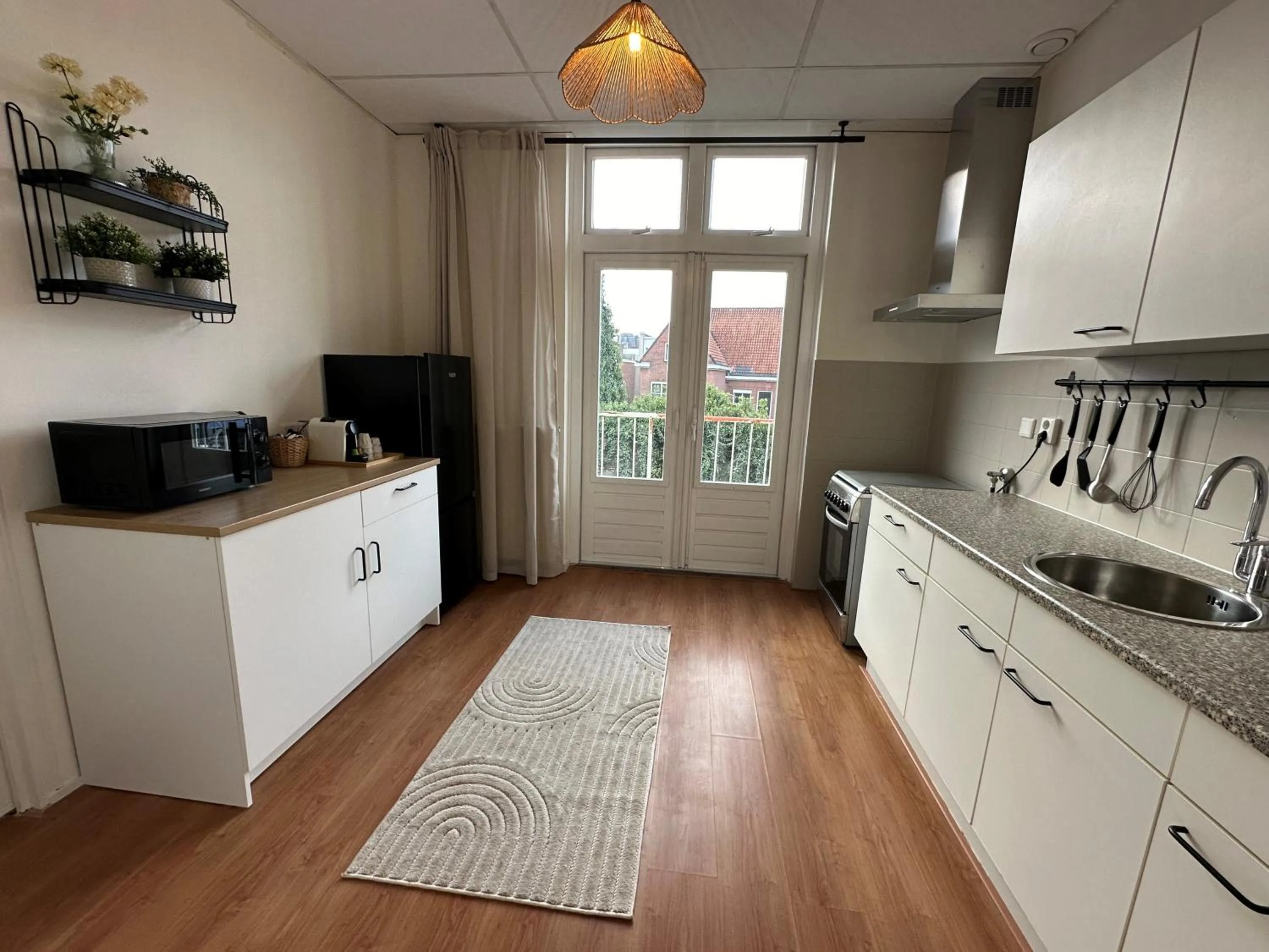 Kitchen or kitchenette in BnB Bruxelles - Studios & Apartments