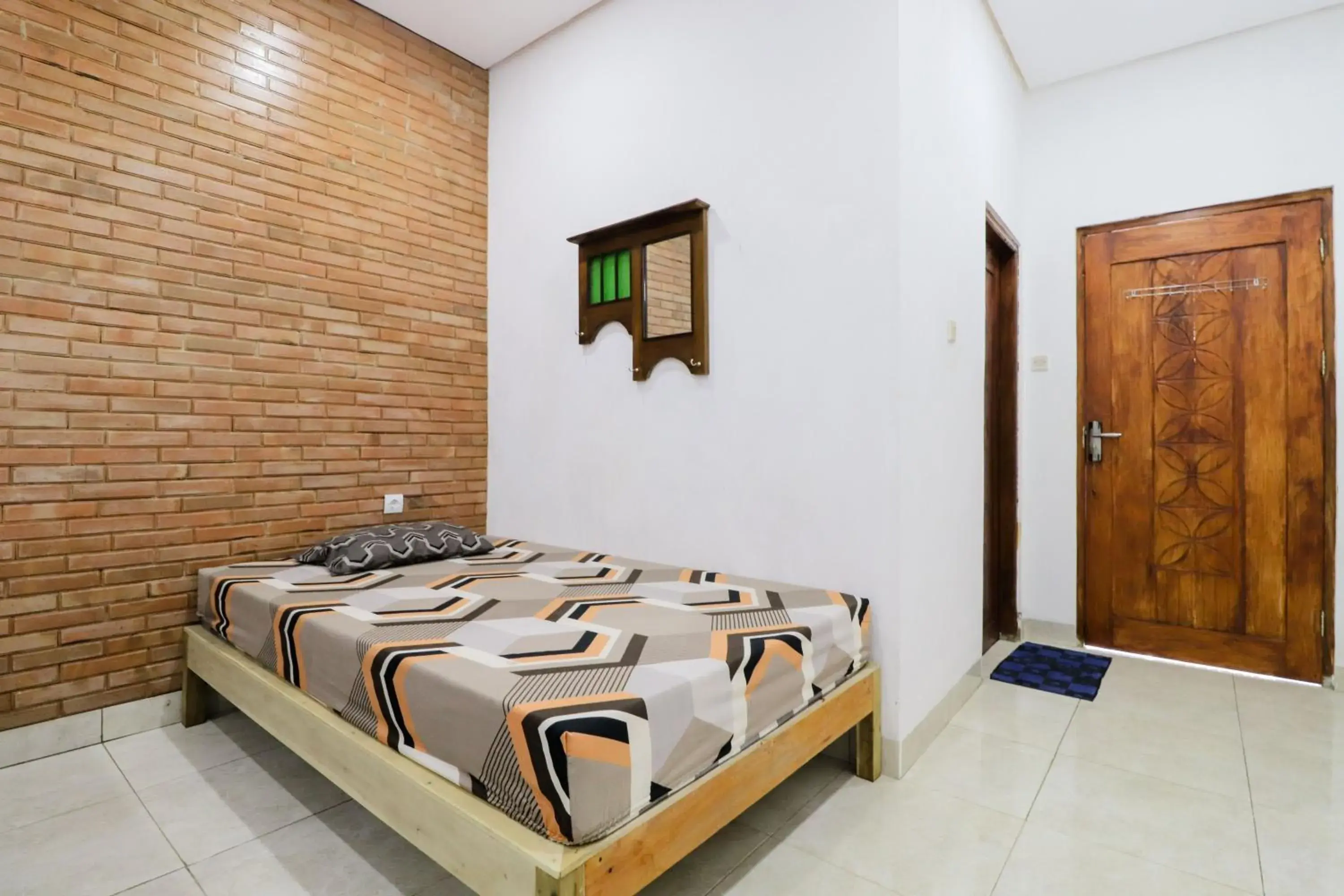 Bed in Penginapan Widodo Syariah Borobudur Bed in Penginapan Widodo Syariah Borobudur