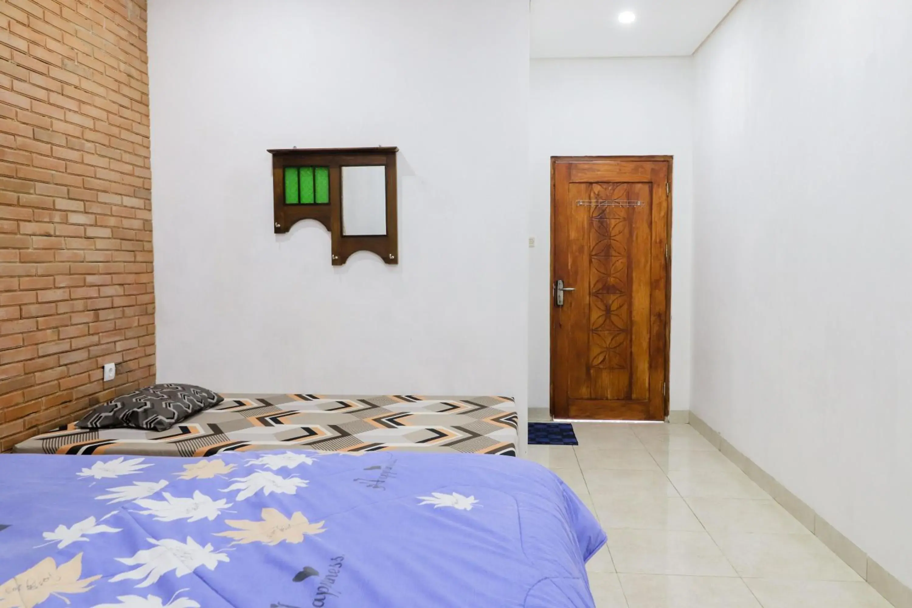 Bed in Penginapan Widodo Syariah Borobudur Bed in Penginapan Widodo Syariah Borobudur