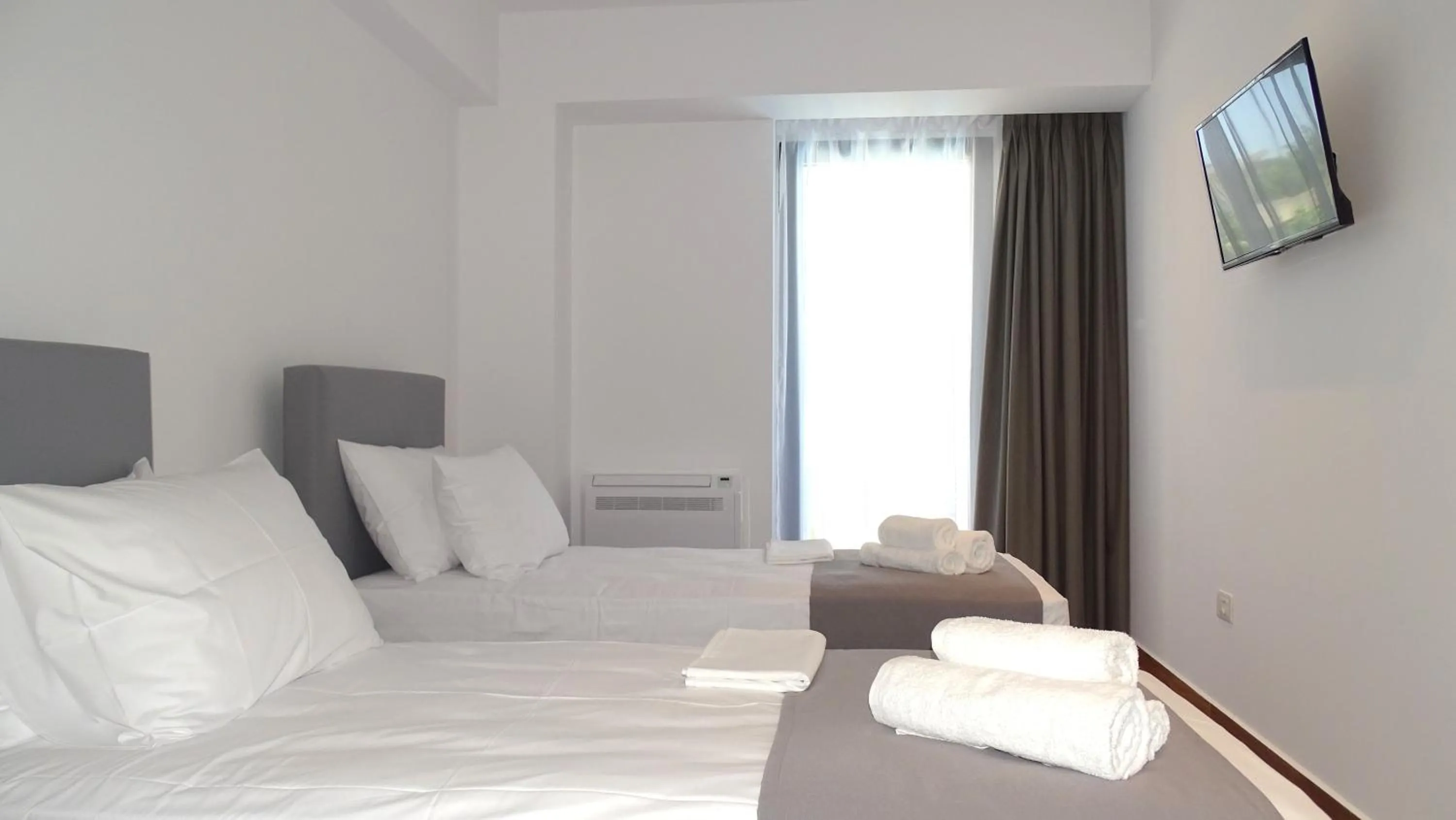 Bed in Valmar Hotel