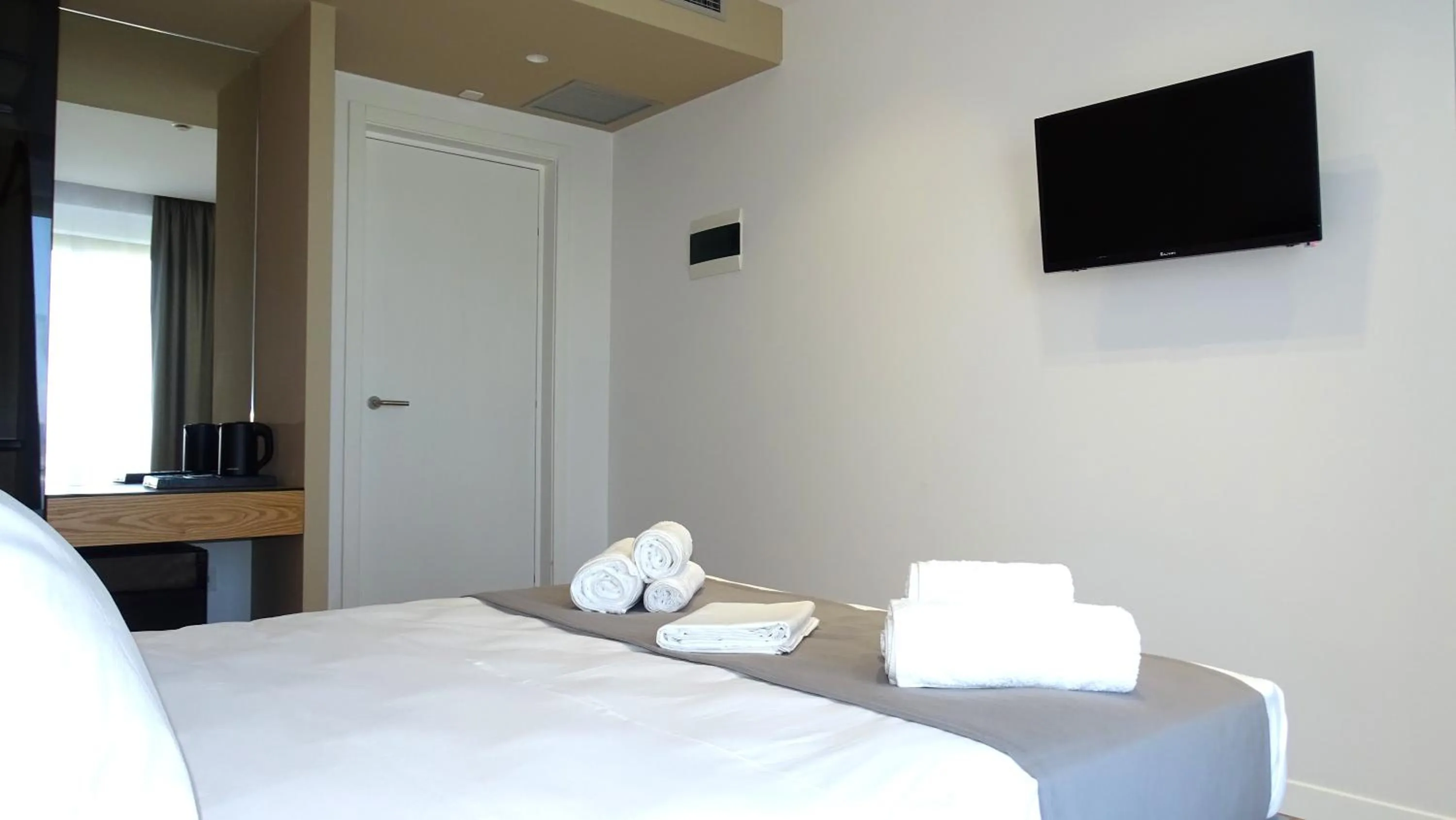 Bed in Valmar Hotel