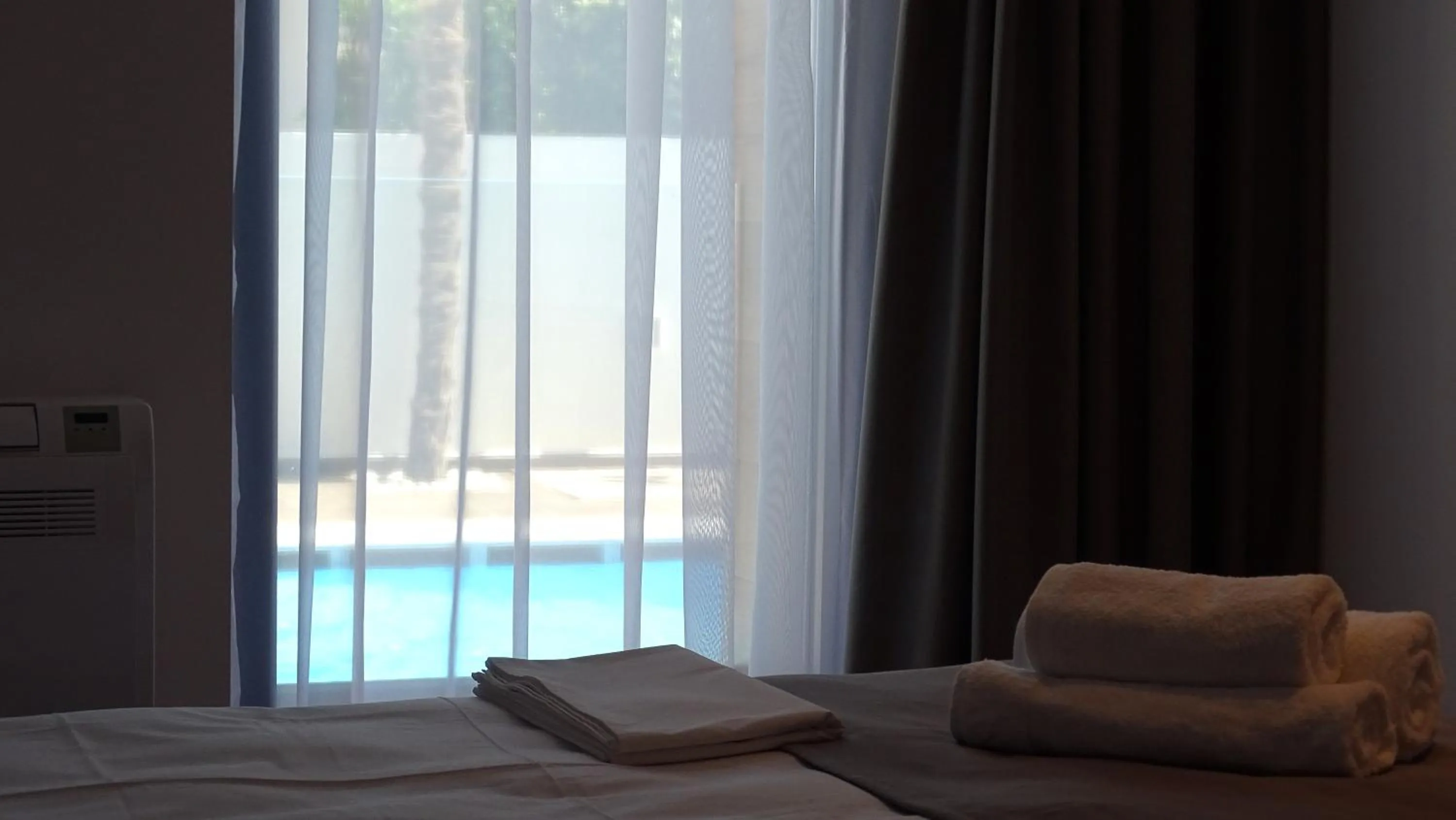 Bed in Valmar Hotel